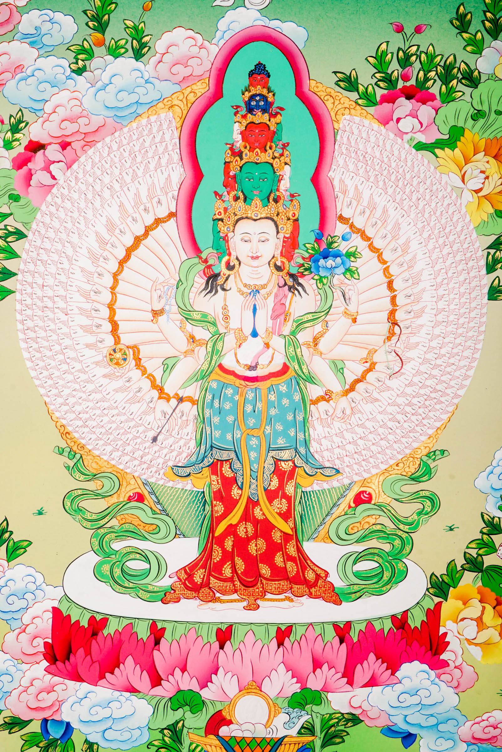 A sacred hand-painted thangka art showcasing Avalokeshwor surrounded by a stunning circle of a thousand arms.