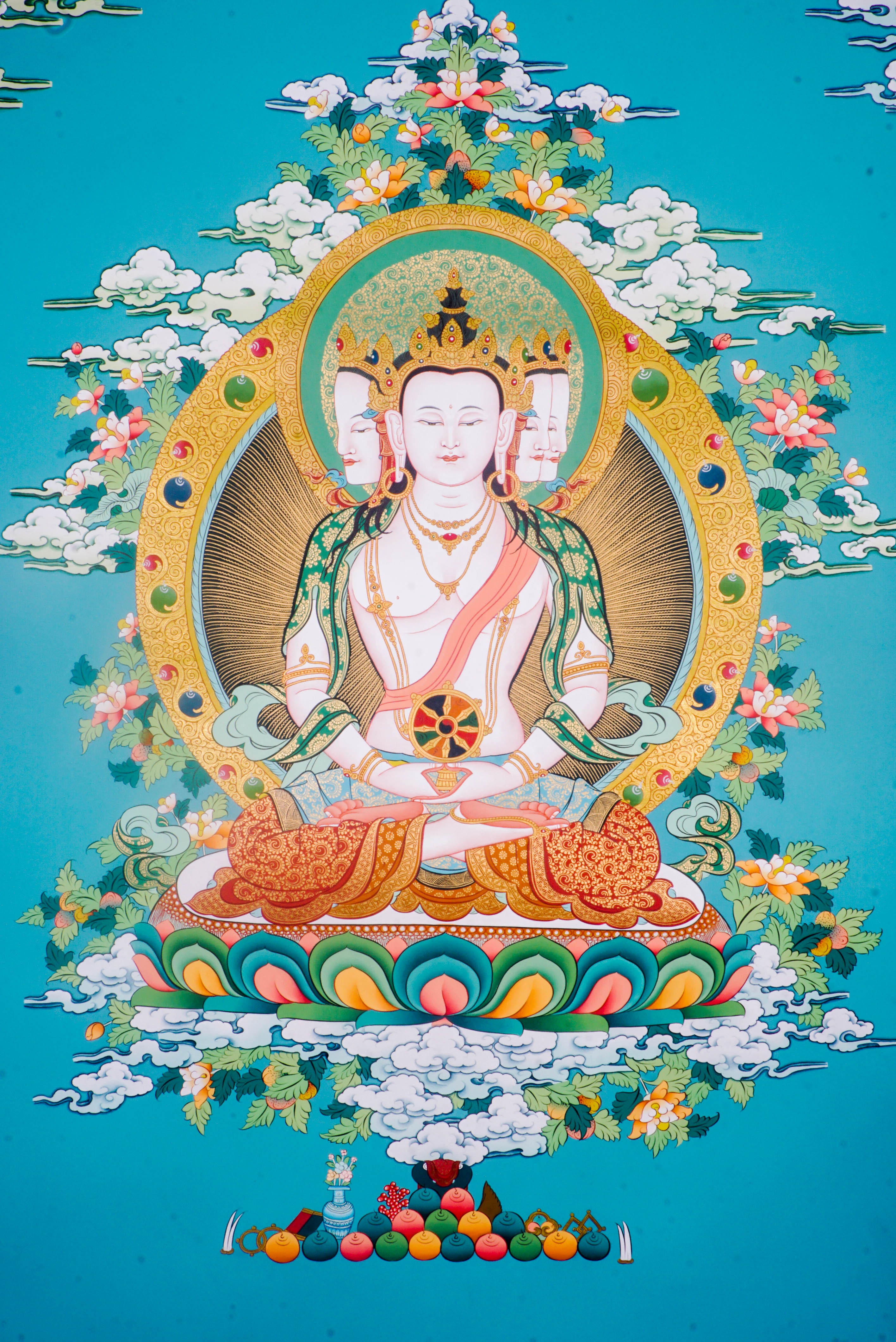 The Three-Headed Amitayus Buddha Thangka is a hand-painted depiction of the Buddha of Infinite Life, symbolizing longevity, wisdom, and compassion. Ideal for meditation or sacred spaces, this traditional artwork radiates spiritual energy and offers blessings of health and inner peace. 