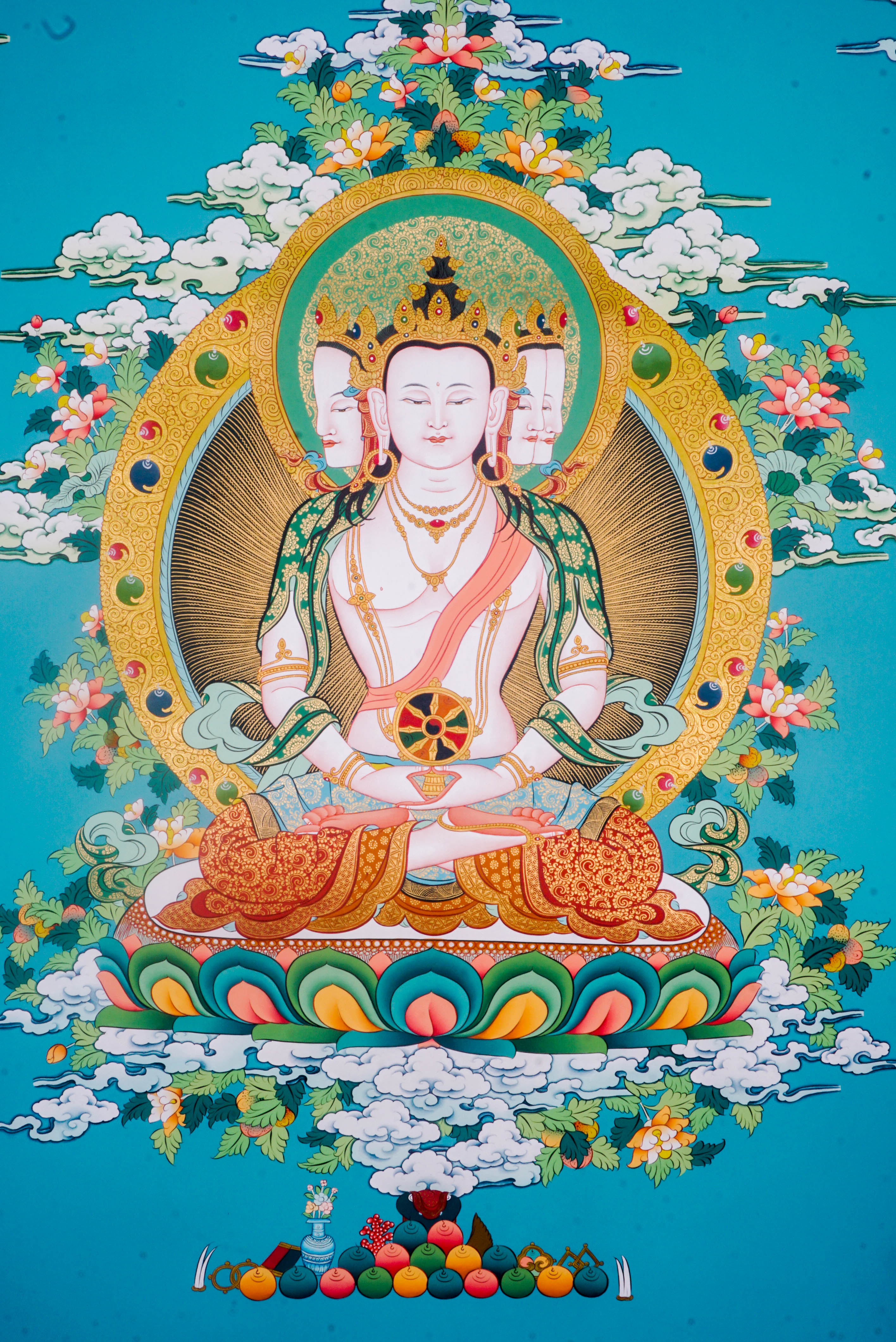 The Three-Headed Amitayus Buddha Thangka is a hand-painted depiction of the Buddha of Infinite Life, symbolizing longevity, wisdom, and compassion. Ideal for meditation or sacred spaces, this traditional artwork radiates spiritual energy and offers blessings of health and inner peace. 