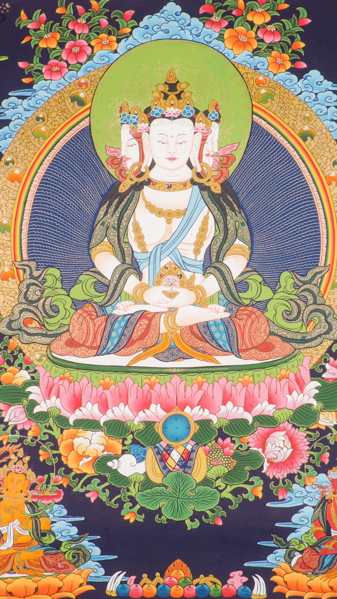 Hand-painted three-headed Vairocana Buddha thangka with Manjushree below, detailed 24k gold ornaments and lotus throne in traditional Himalayan style.
