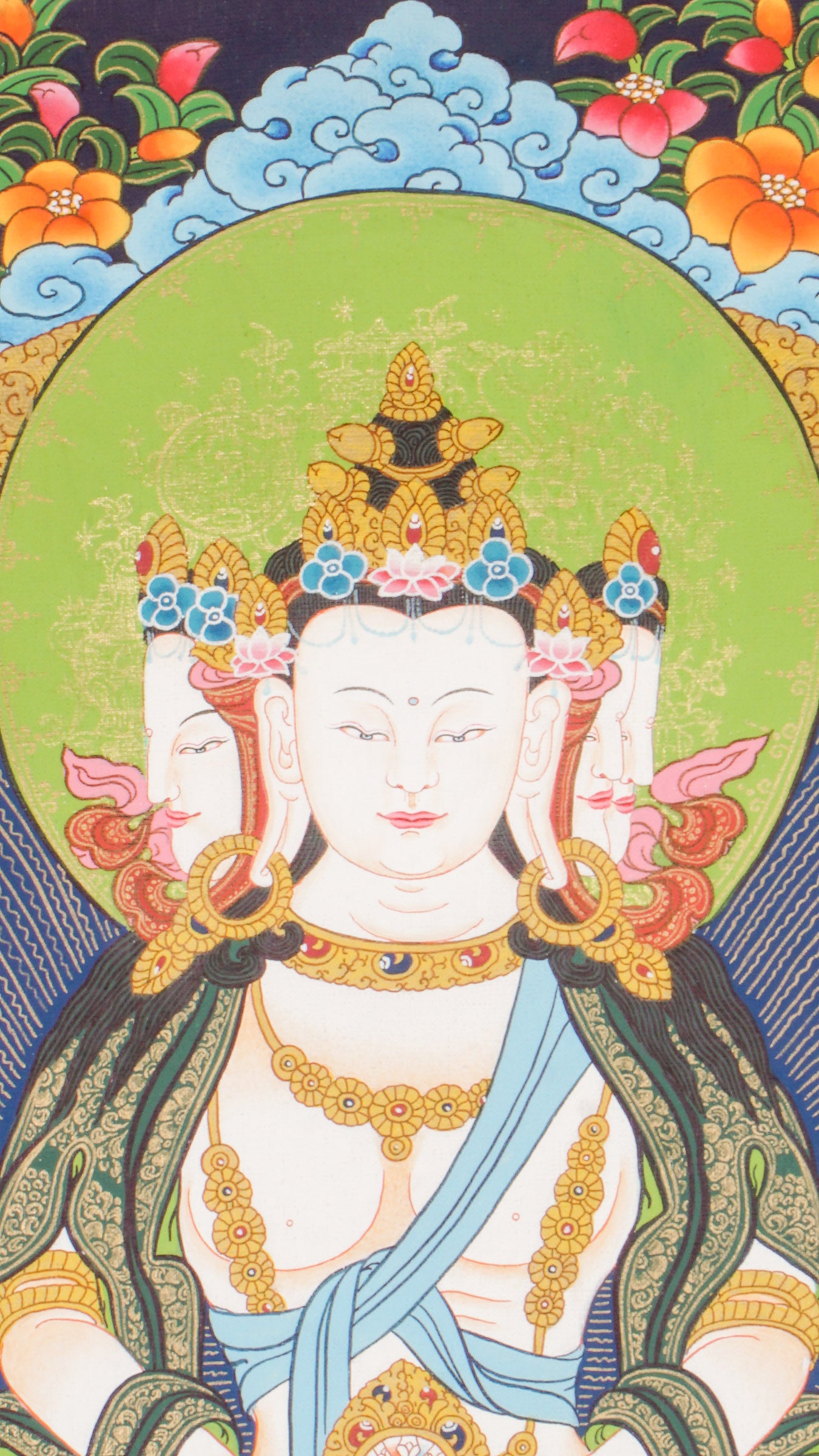 Hand-painted three-headed Vairocana Buddha thangka with Manjushree below, detailed 24k gold ornaments and lotus throne in traditional Himalayan style.