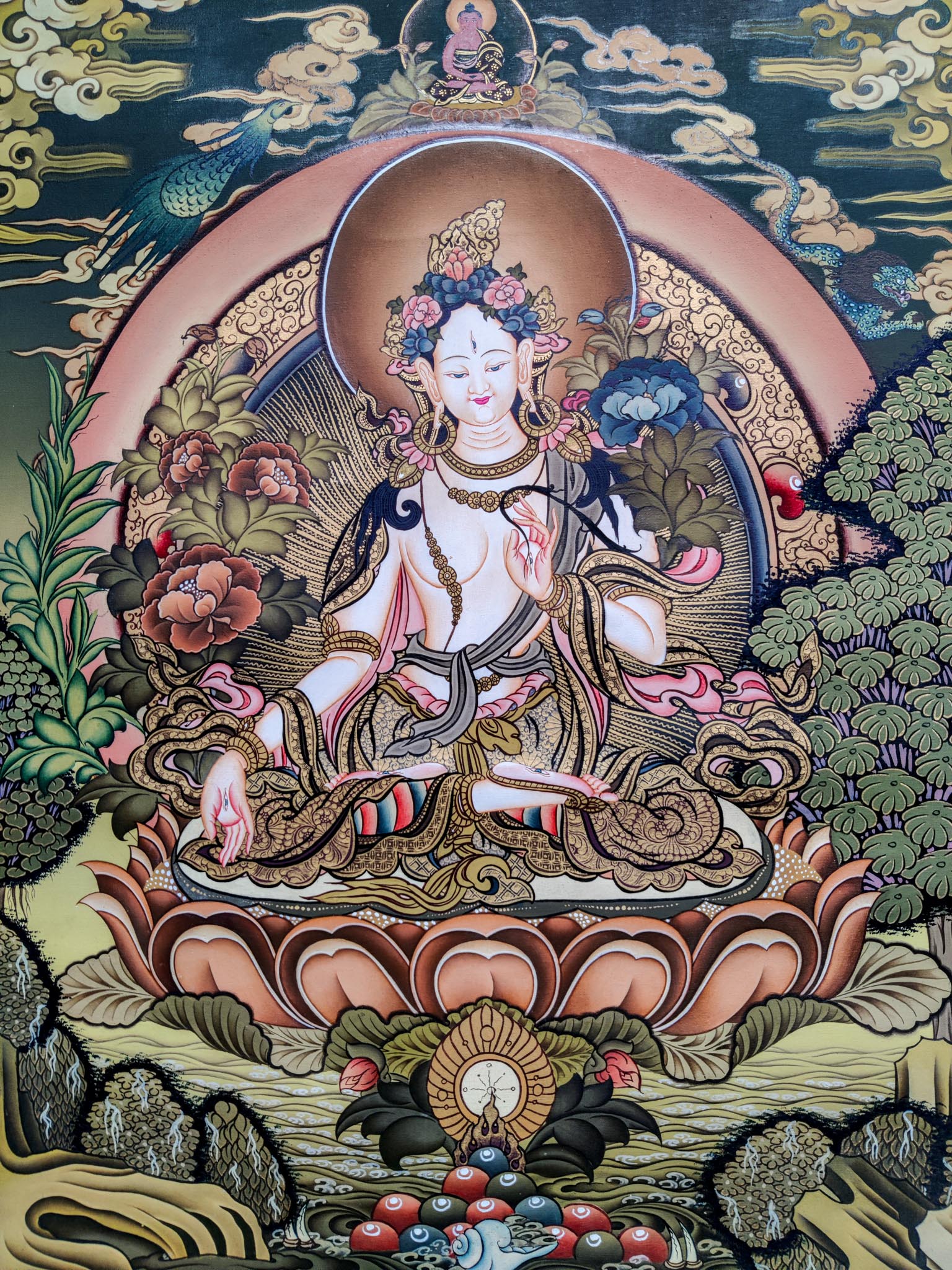 This White Tara Thangka Painting is ideal for establishing serenity and enlightenment in your home or other sacred space.