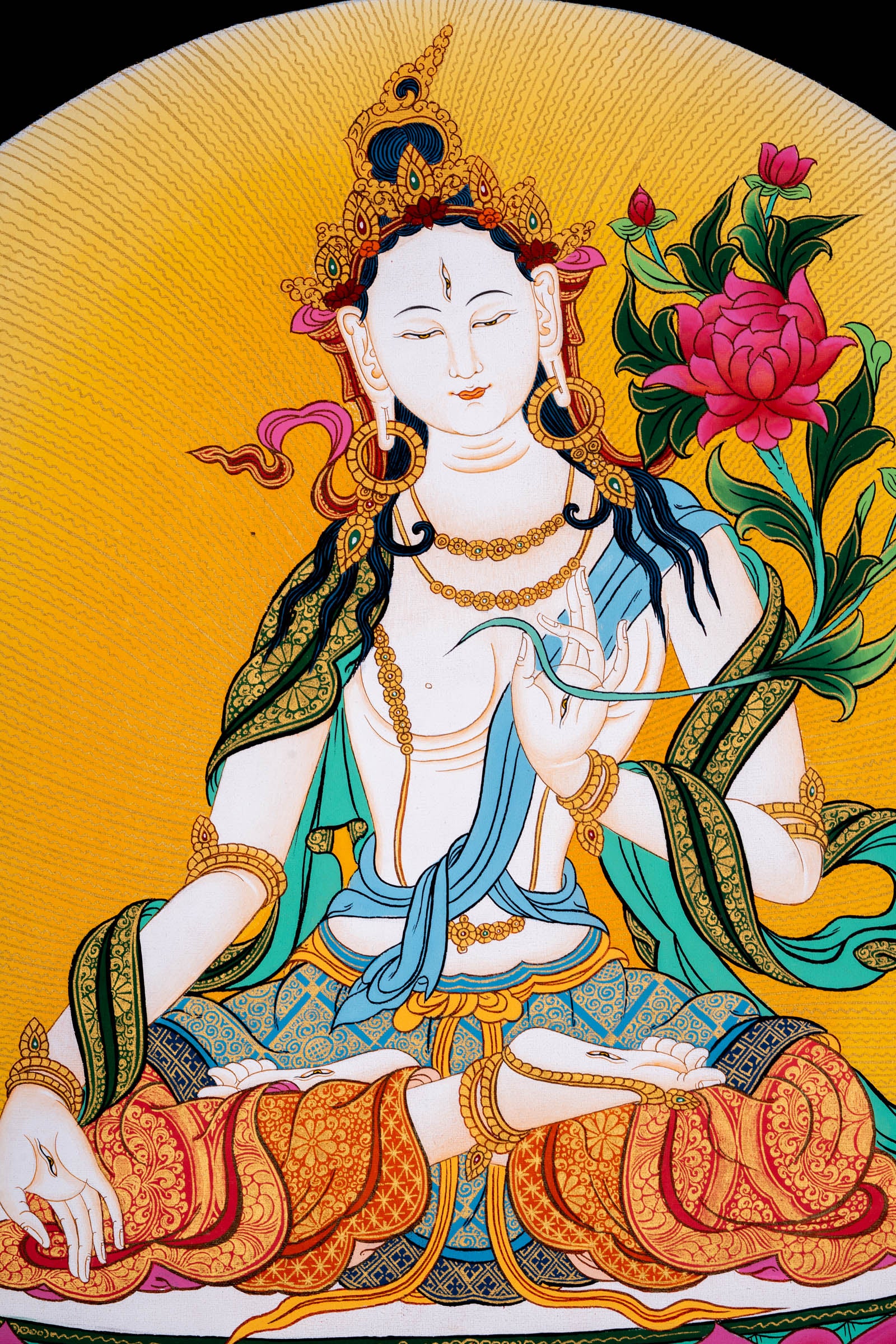 This genuine Tibetan Thangka of White Tara represents healing, compassion, and longevity, revered in Tibetan Buddhism for her nurturing and protective presence. Hand-painted using traditional methods and mineral pigments, it radiates serene energy ideal for any sacred or meditation space.
