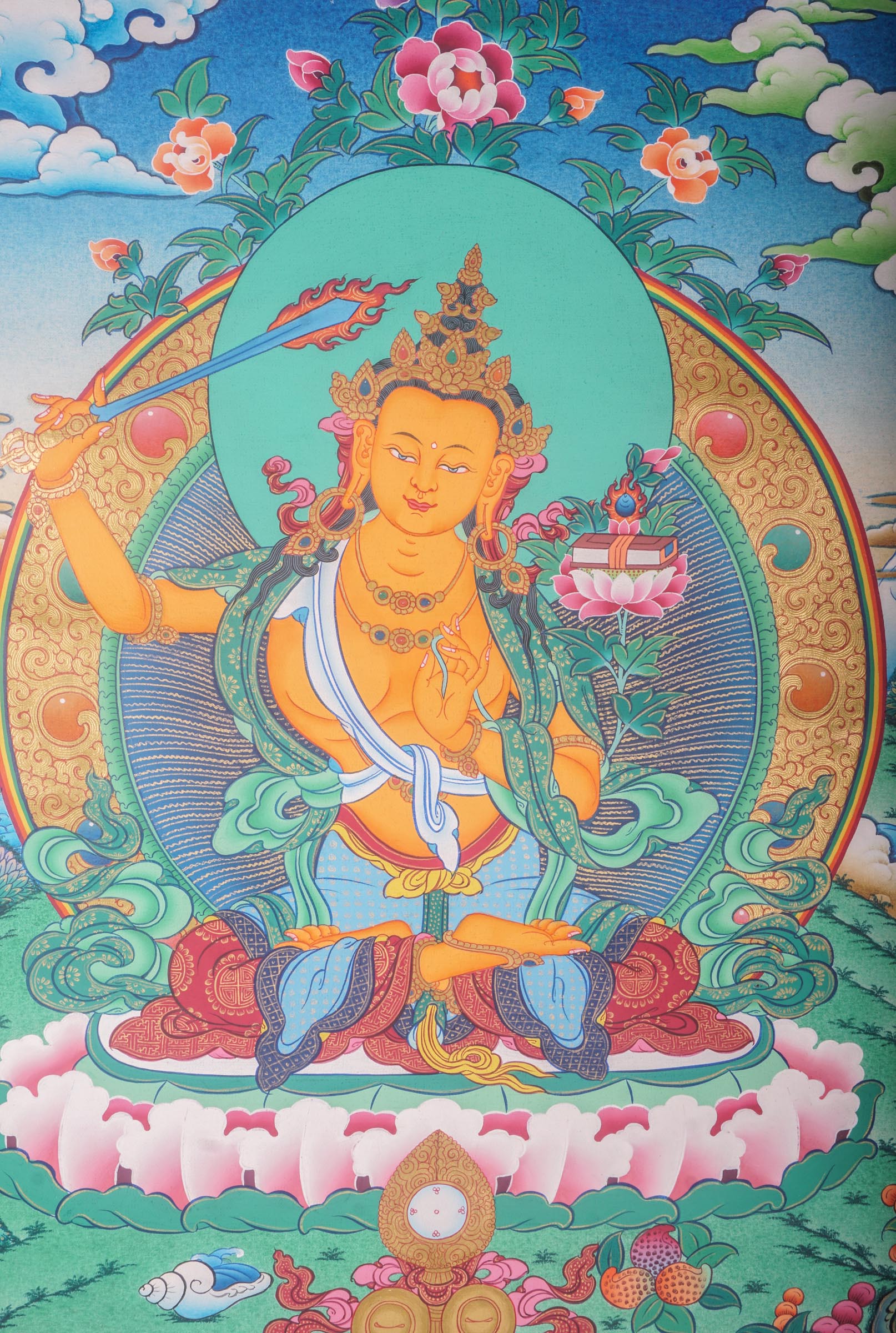 This genuine Tibetan Thangka of Manjushri embodies the enlightened wisdom of Buddhism, hand-painted with natural pigments by skilled artisans. A symbol of clarity and knowledge, this Buddhist artwork is perfect for any sacred or meditative space.