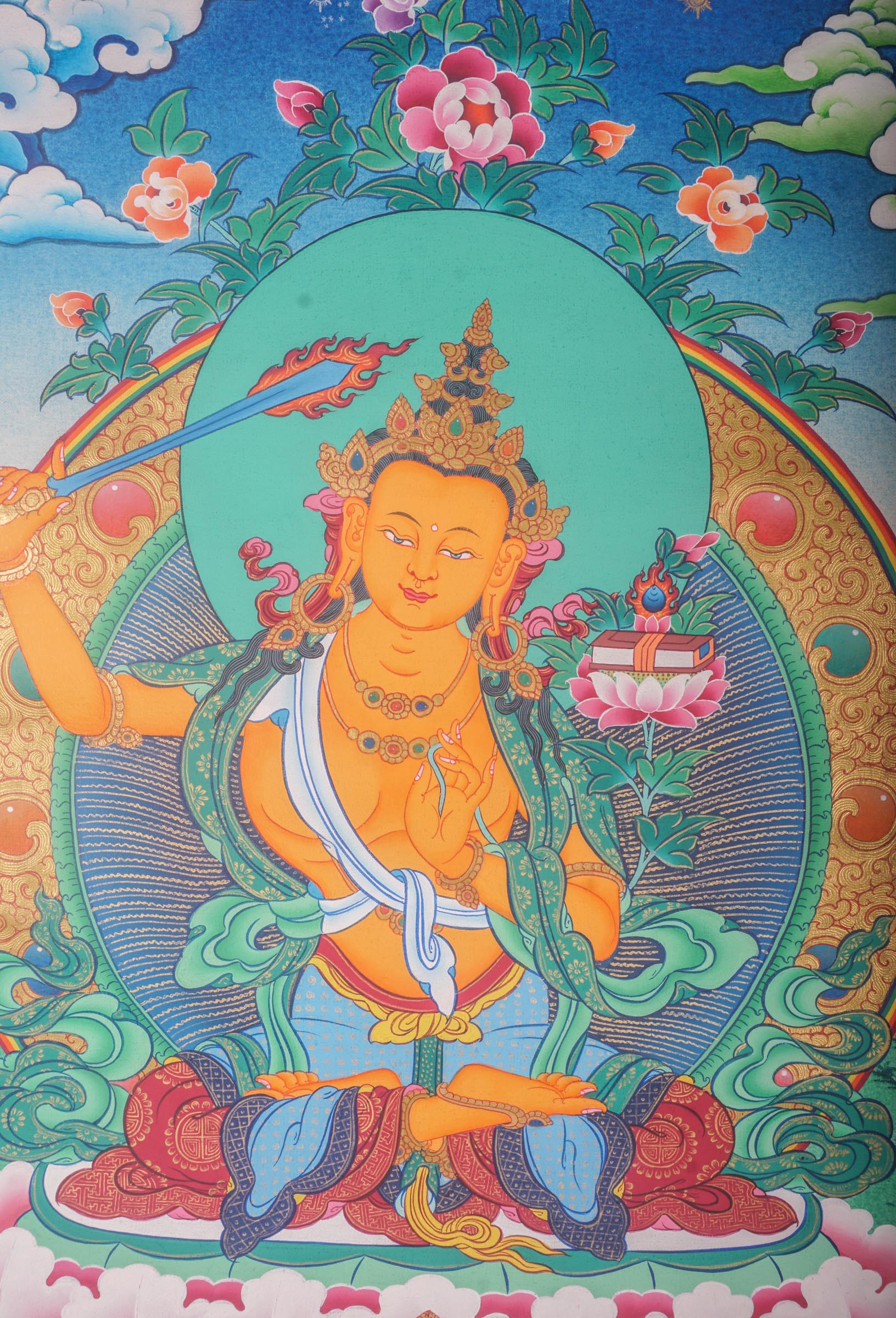 This genuine Tibetan Thangka of Manjushri embodies the enlightened wisdom of Buddhism, hand-painted with natural pigments by skilled artisans. A symbol of clarity and knowledge, this Buddhist artwork is perfect for any sacred or meditative space.