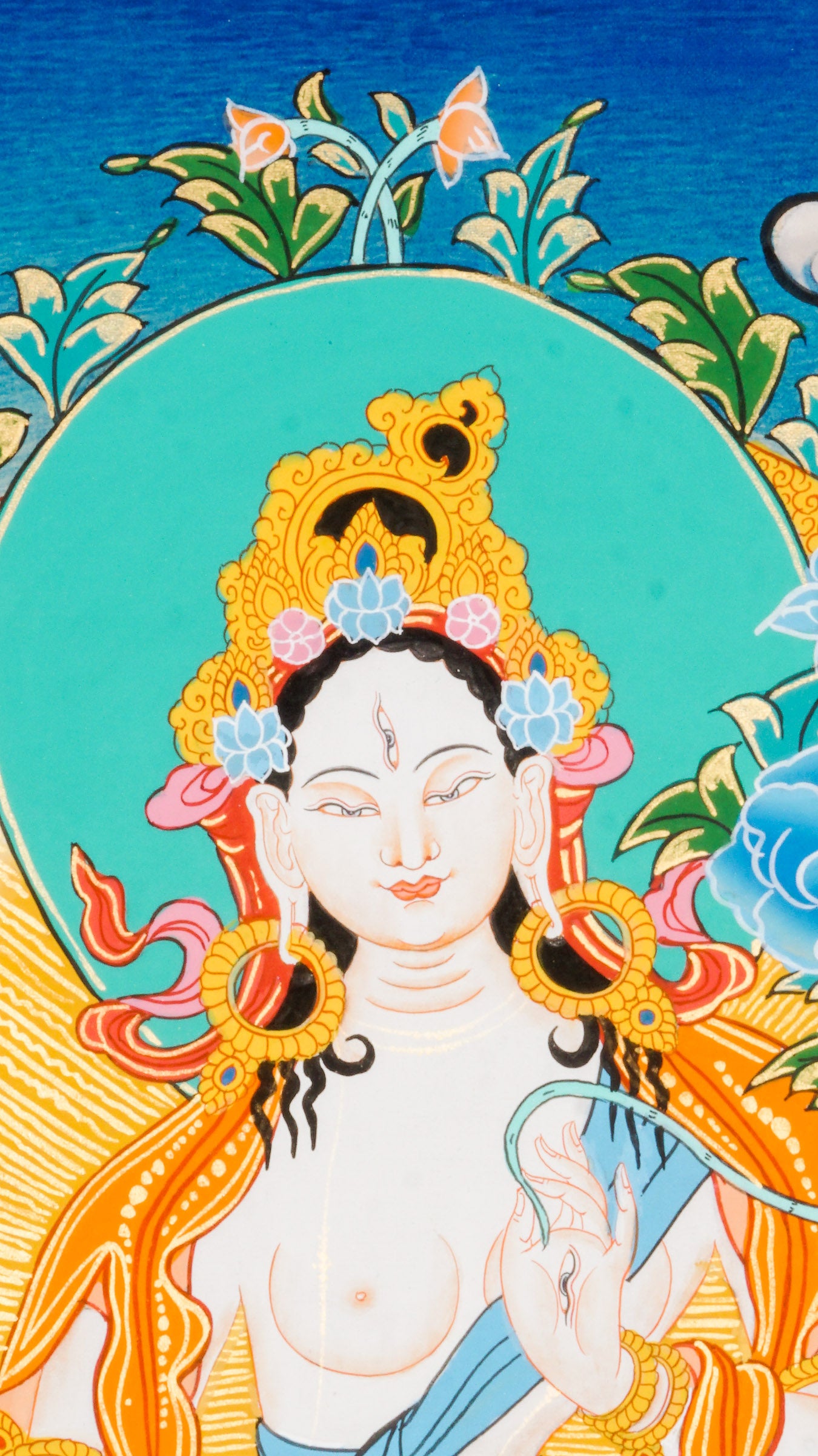 Beautiful hand-painted thangka art portraying White Tara, the bodhisattva of compassion with 24k gold and natural pigments.