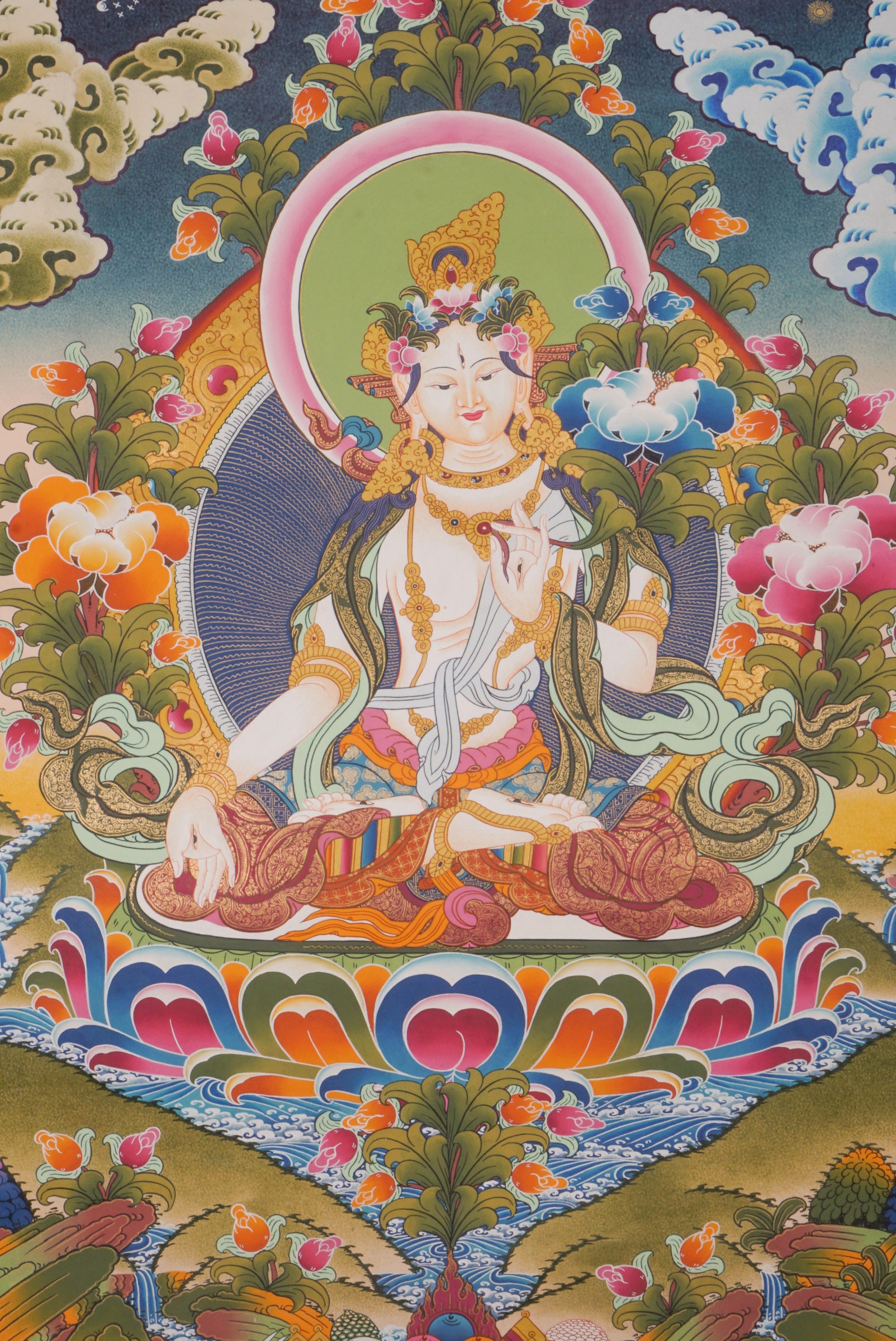 This authentic White Tara Thangka is a sacred symbol of healing, compassion, and longevity, hand-painted on genuine canvas using traditional mineral pigments. Its serene presence brings blessings and protection, making it a meaningful addition to any spiritual space or a heartfelt gift for seekers.
