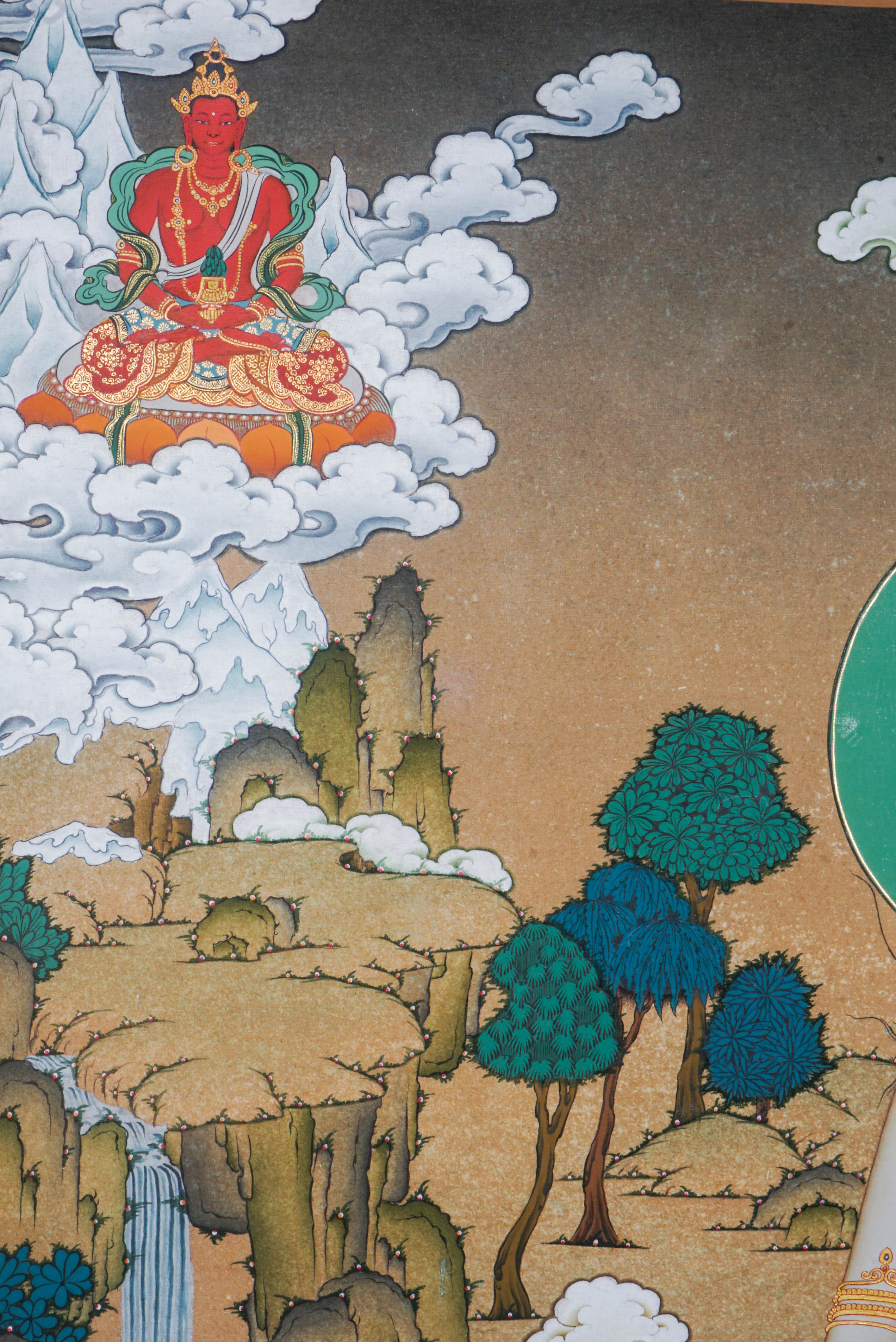 Hand-painted White Tara thangka artwork featuring traditional Tibetan Buddhist iconography, lotus base, scenic landscape, and intricate detailing.