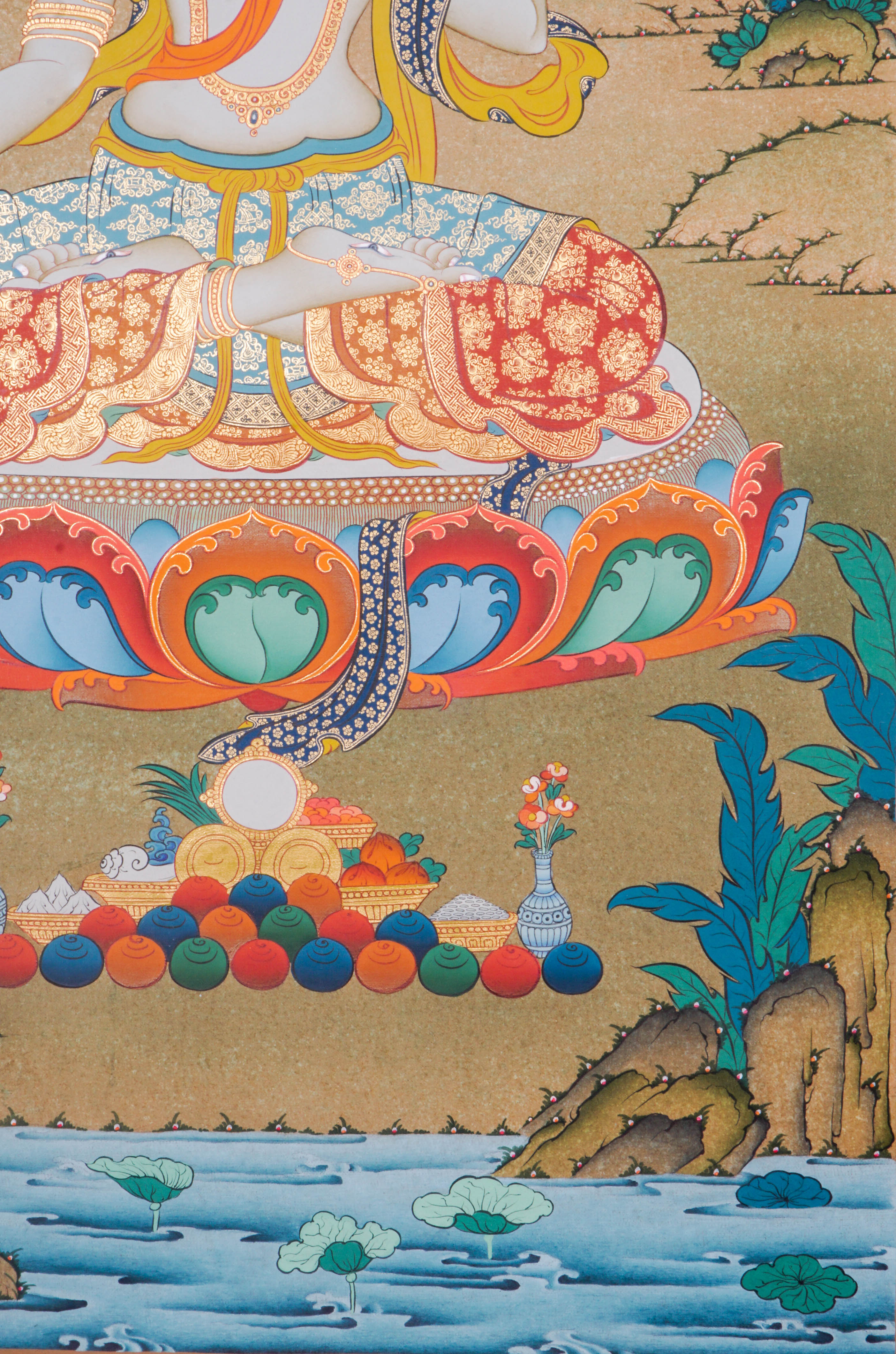 Hand-painted White Tara thangka artwork featuring traditional Tibetan Buddhist iconography, lotus base, scenic landscape, and intricate detailing.