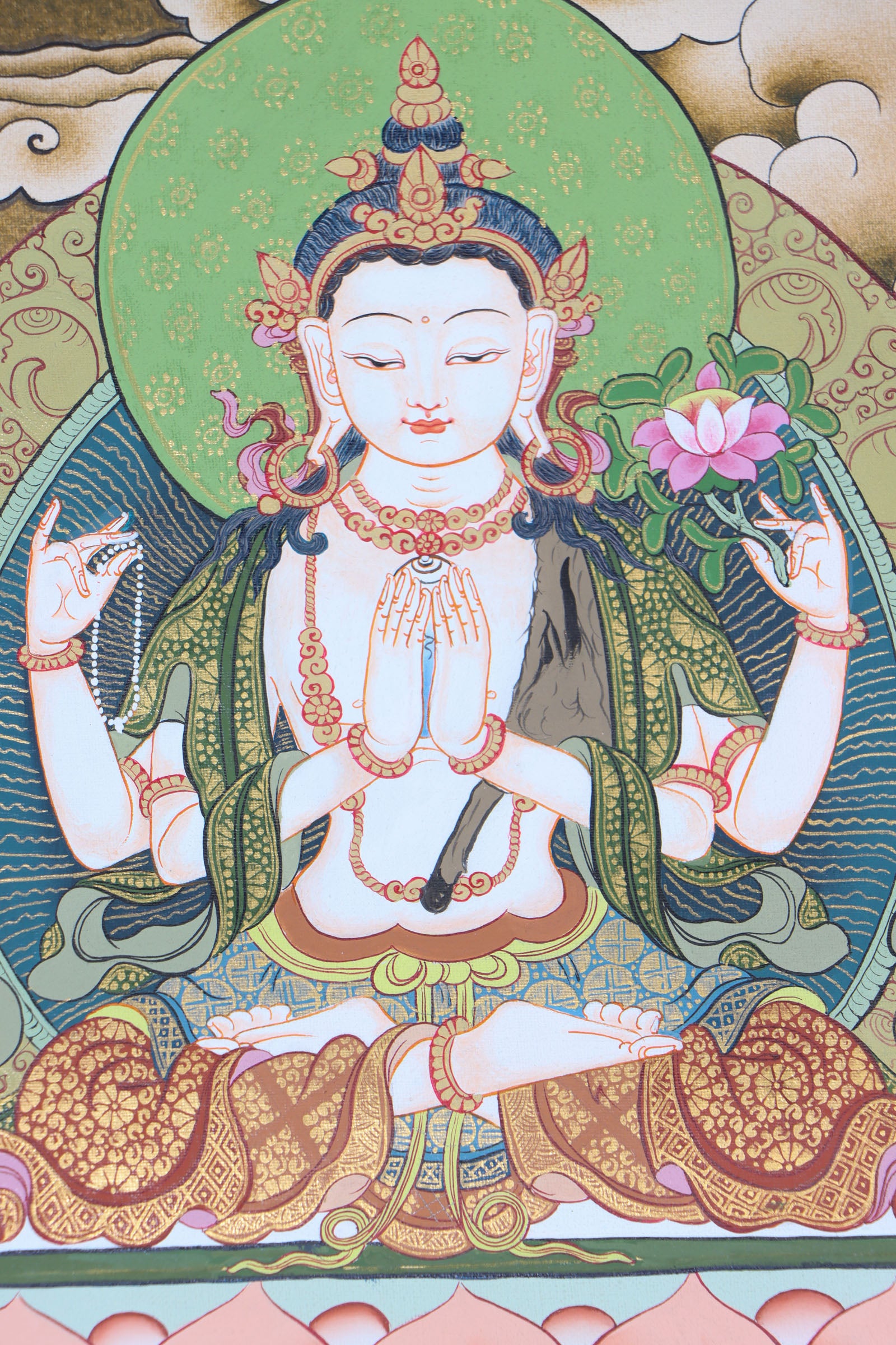 This genuine White Tara Thangka is a captivating piece of Tibetan art symbolizing compassion, purity, and healing. Hand-painted by skilled artisans using all-natural mineral pigments, it features White Tara seated in serene grace with seven vigilant eyes, offering blessings of peace, longevity, and spiritual protection.