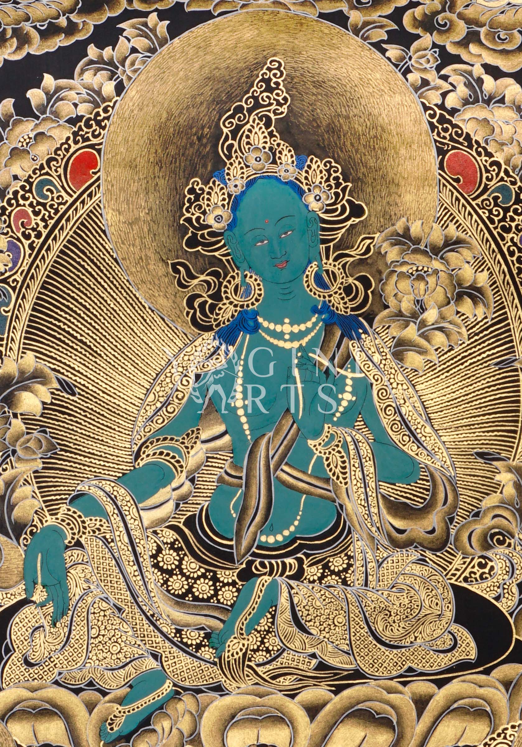 Black and Gold Green Tara thangka featuring the  Buddhist goddess seated on a lotus throne surrounded by golden floral motifs and celestial figures