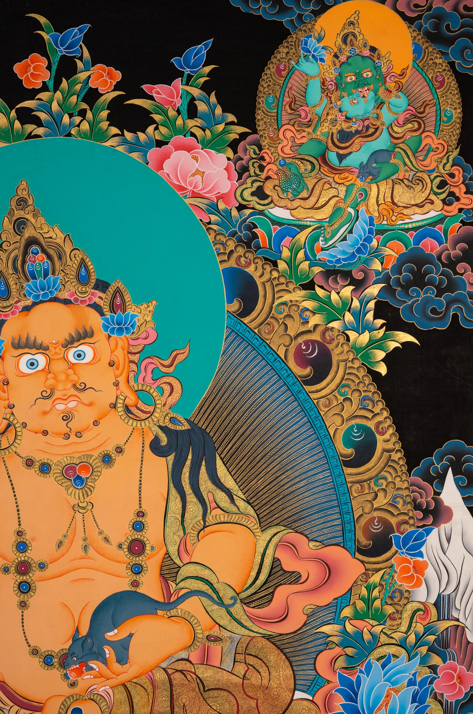 Zambala thangka painting showing a golden seated figure with wide eyes and ornate jewelry, positioned on a lotus base, surrounded by floral patterns, clouds, and multiple smaller seated figures above and below against a dark background.