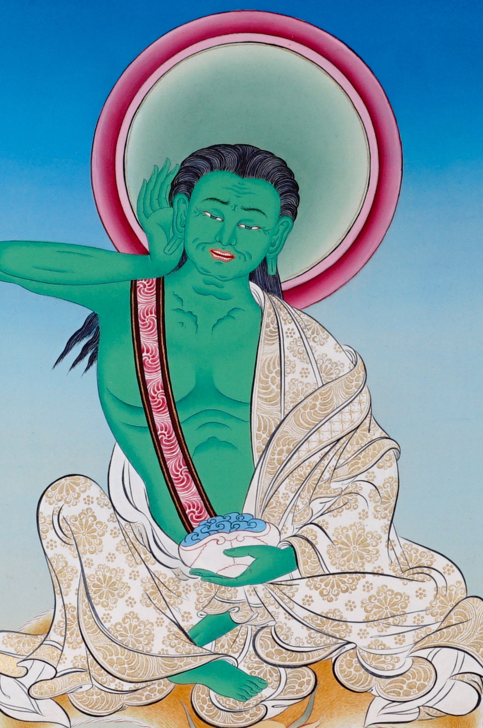 Hand-painted Milarepa Thangka showing Tibetan Buddhist yogi seated on deer skin with skull cup and listening gesture, blue background, traditional Himalayan art.