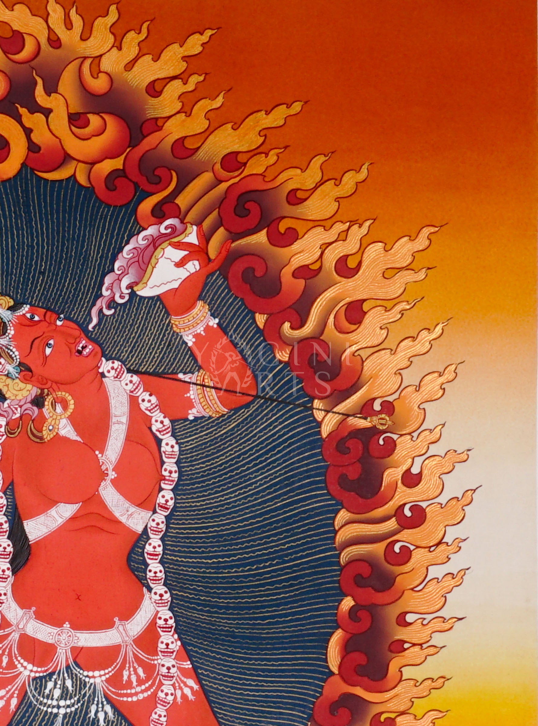 Vajrayogini thangka showing the red tantric Buddhist dakini dancing with skull garland, holding a kapala and ritual knife within a flaming aura.