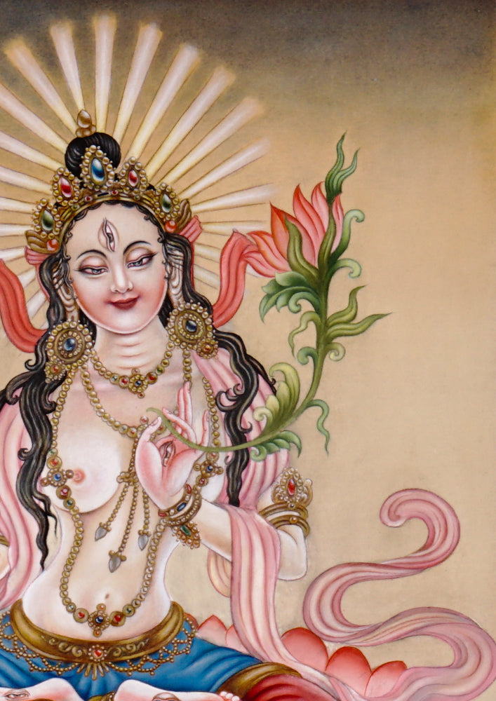 Hand-painted Newari White Tara thangka showing the Buddhist goddess of compassion seated on a lotus throne holding a utpala flower.