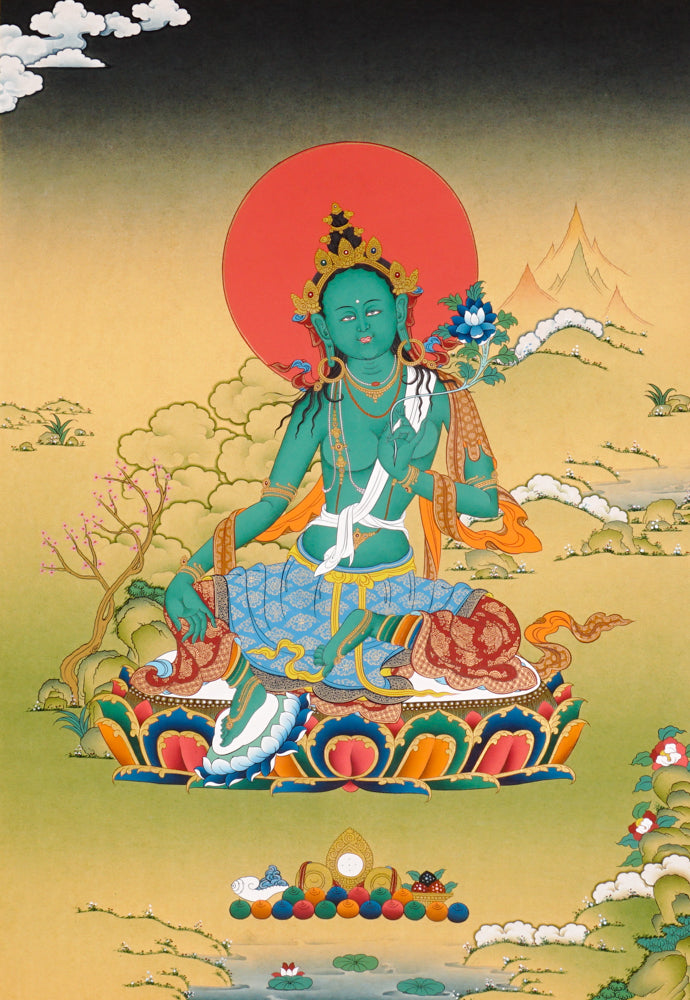 Hand-painted Green Tara thangka showing the Buddhist goddess seated on a lotus throne holding a blue utpala flower.
