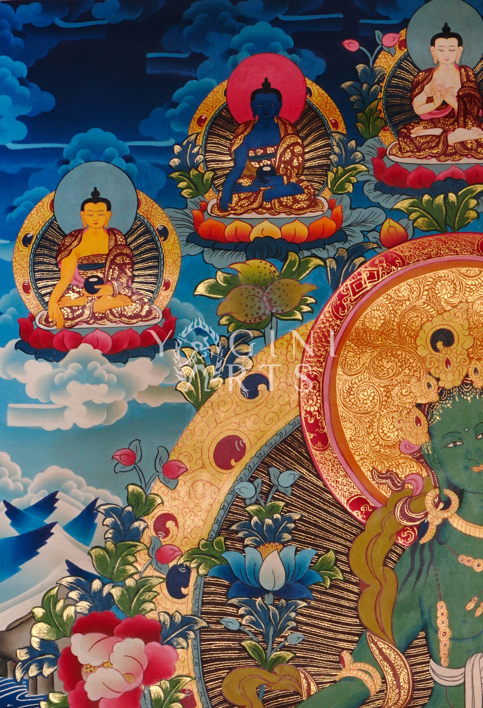 Green Tara thangka featuring the  Buddhist goddess of compassion seated on a lotus throne surrounded by vibrant sacred symbolism and gold detailing