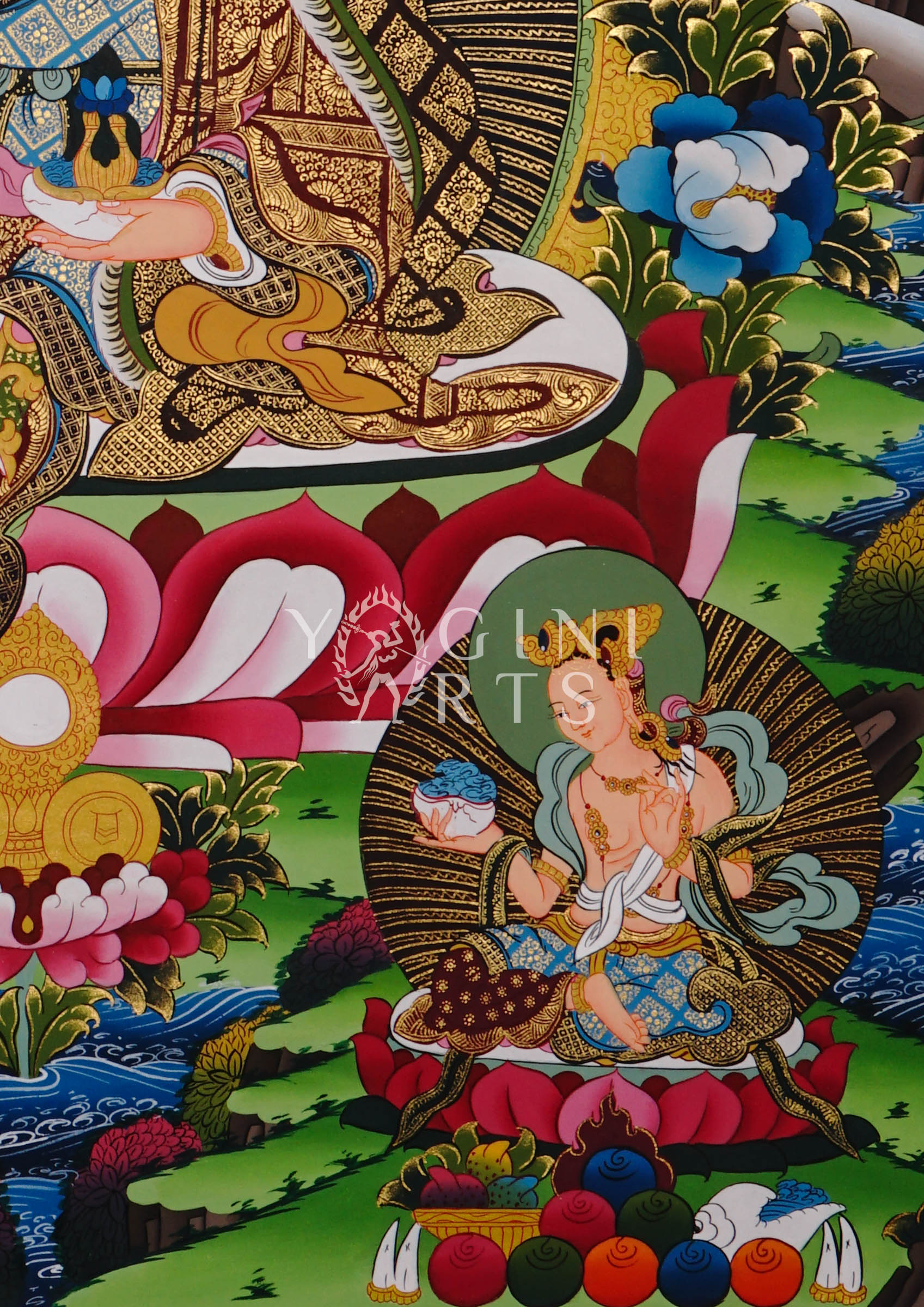 Guru Rinpoche thangka featuring Padmasambhava seated on a lotus throne with sacred tantric symbols and intricate Tibetan gold detailing