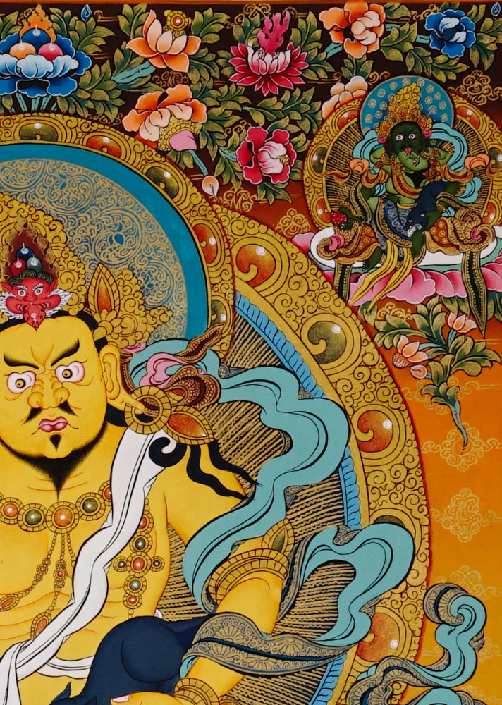 Hand-painted Tibetan Yellow Zambhala thangka featuring wealth deity holding a mongoose, seated on a lotus with rich ornamentation.