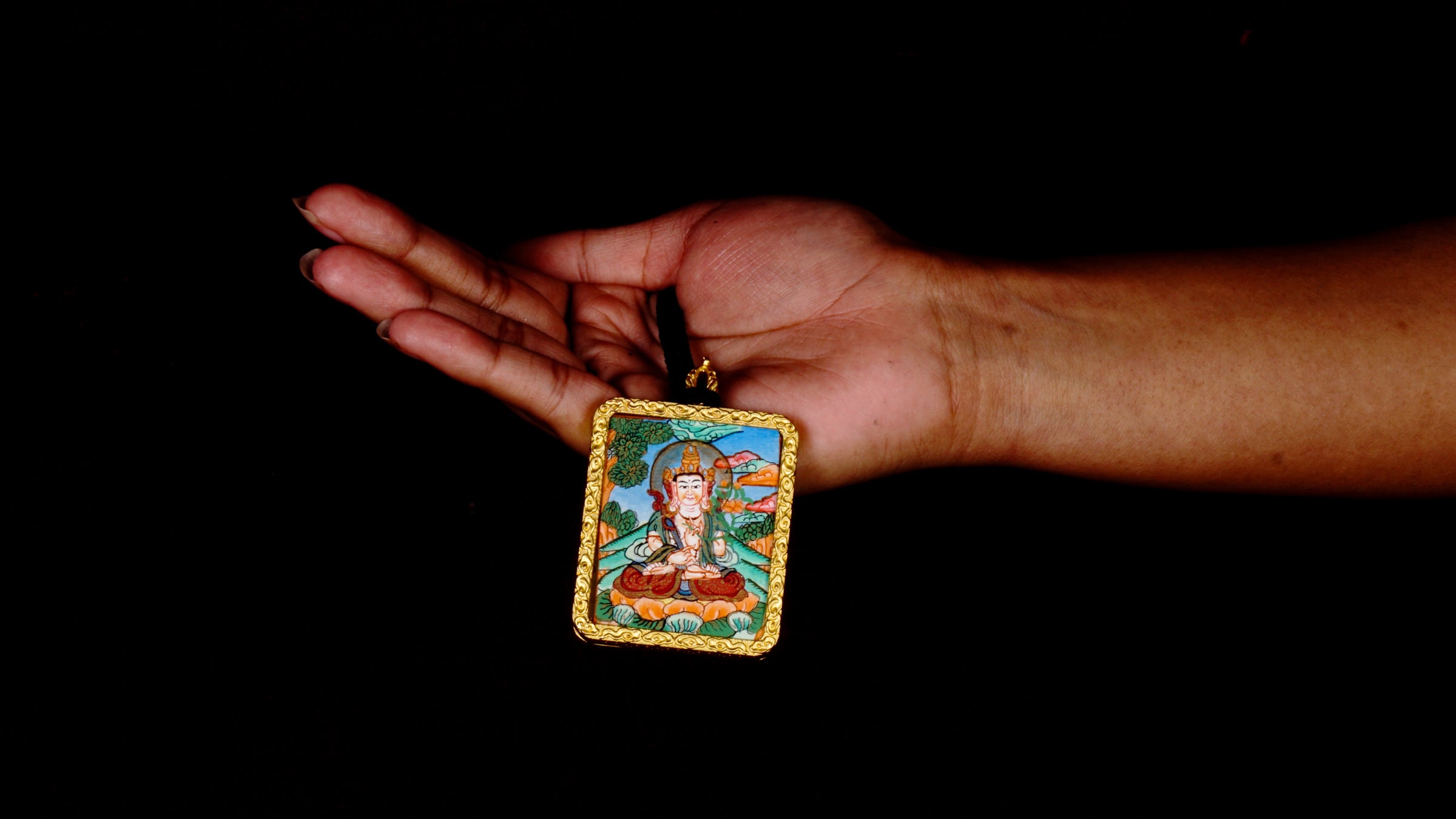 Hand-painted Fushen Fusa Bodhisattva miniature Thangka pendant in gold-accented copper Ghau locket with black beaded cord.