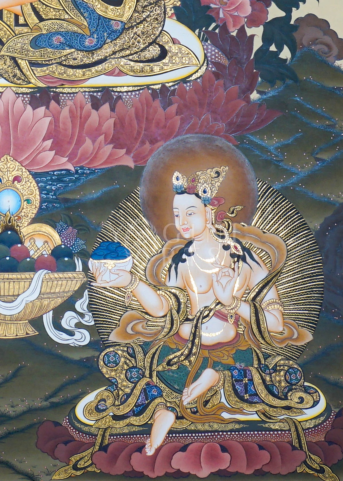 Hand-painted Guru Rinpoche Thangka featuring Guru Padmasambhava with White Tara and Amitayus, natural mineral pigments, gold detailing, and a traditional Himalayan landscape.