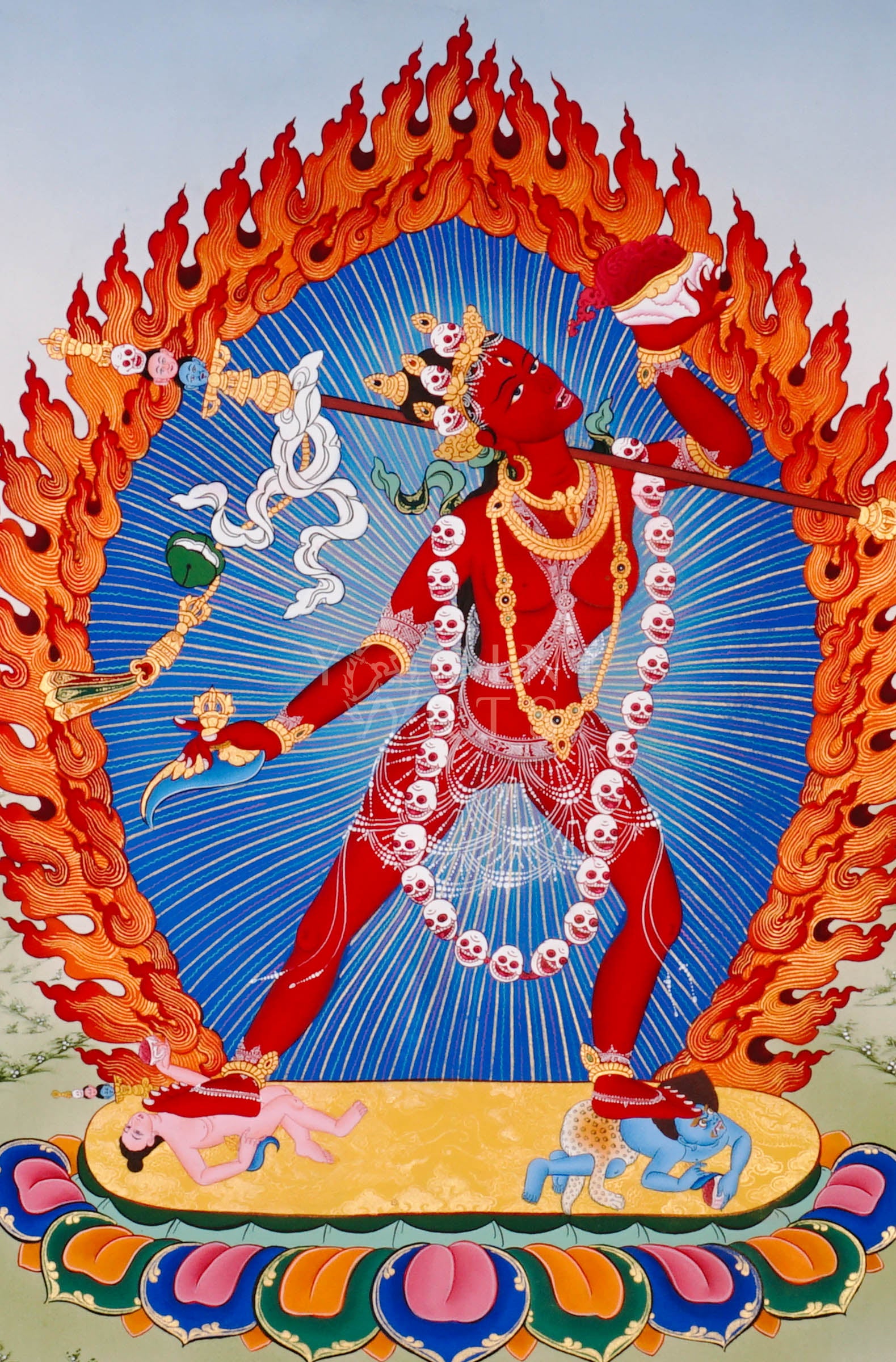 Vajrayogini thangka showing the red tantric dakini dancing with skull garland, holding kapala and ritual knife within a flaming aura.