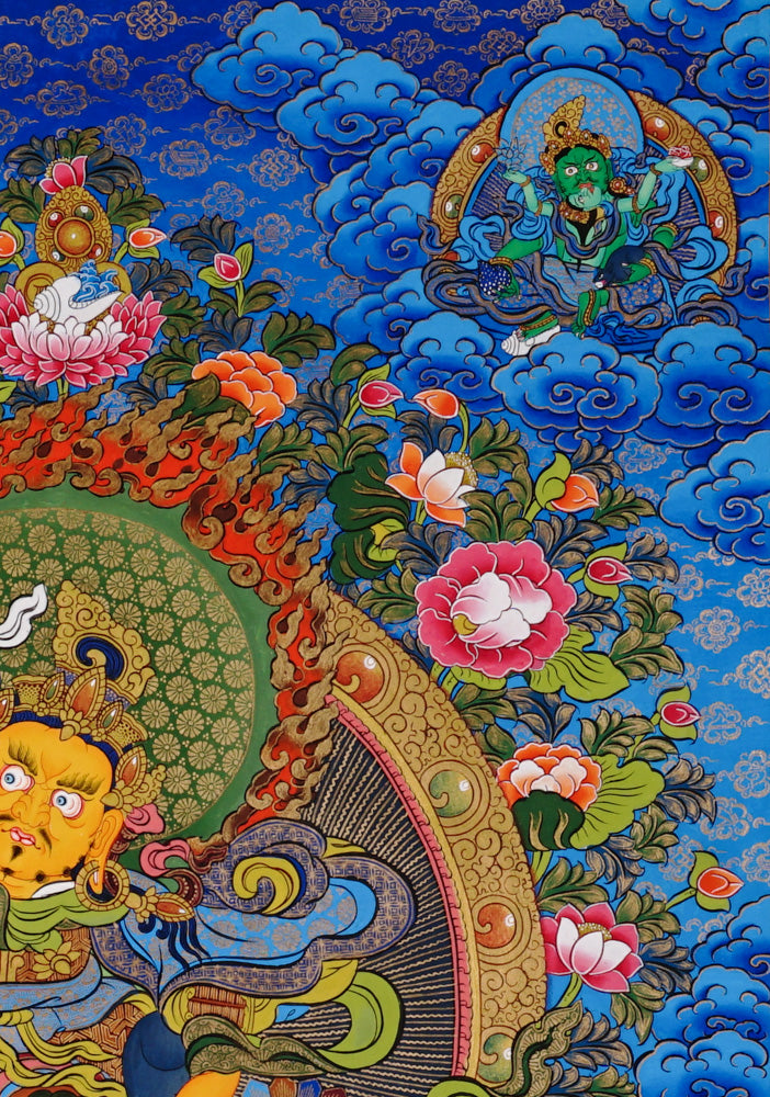 Hand-painted Singh Zambhala thangka with blue background, showing wealth deity riding snow lion and holding mongoose.