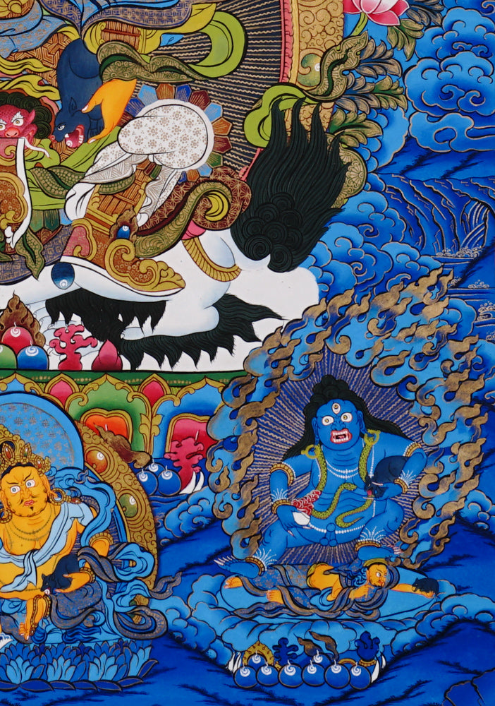 Hand-painted Singh Zambhala thangka with blue background, showing wealth deity riding snow lion and holding mongoose.