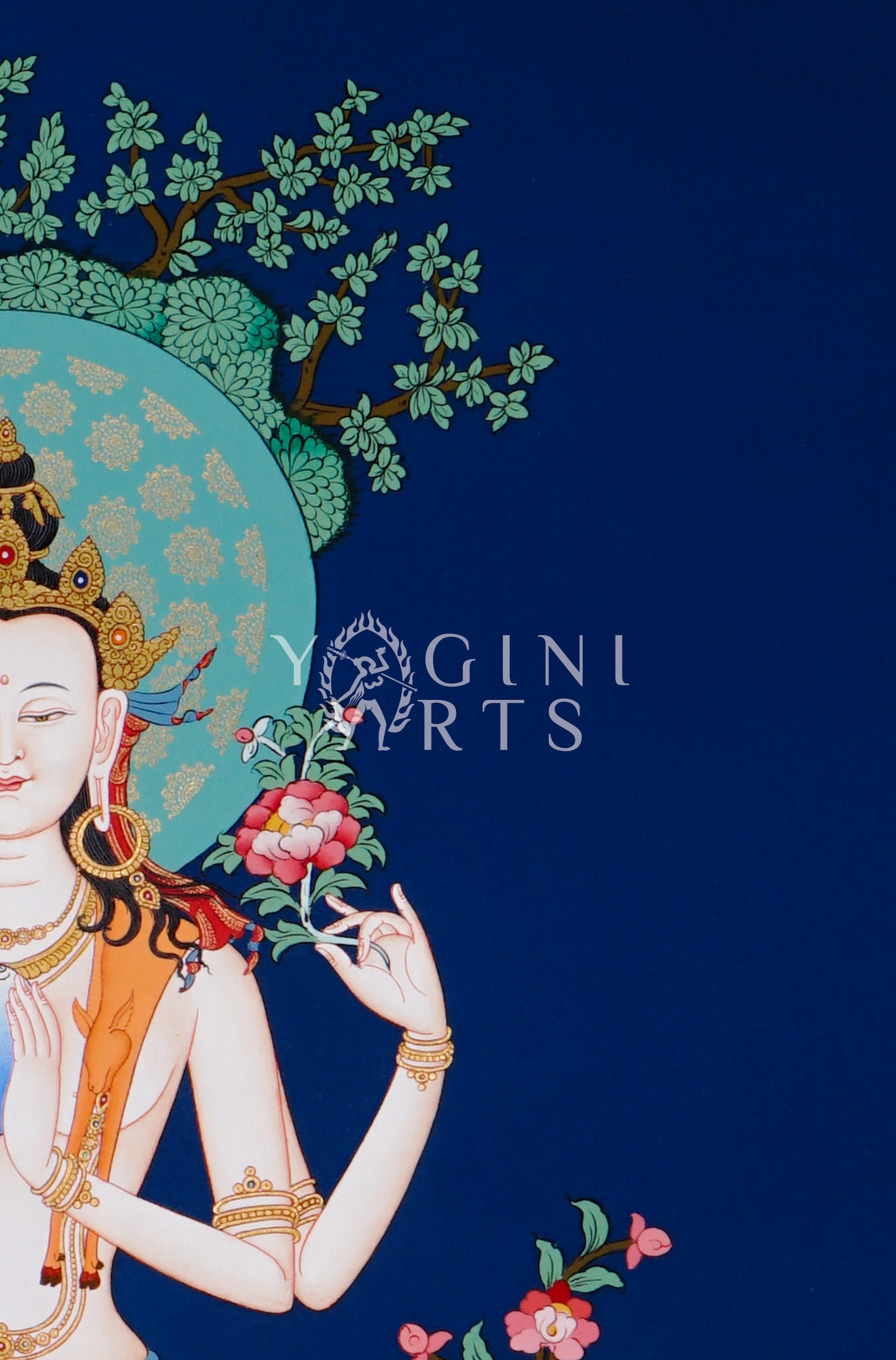 Hand-painted Chenrezig thangka featuring the four-armed Avalokiteshvara seated on a lotus throne with mala beads and lotus flower against a deep blue background