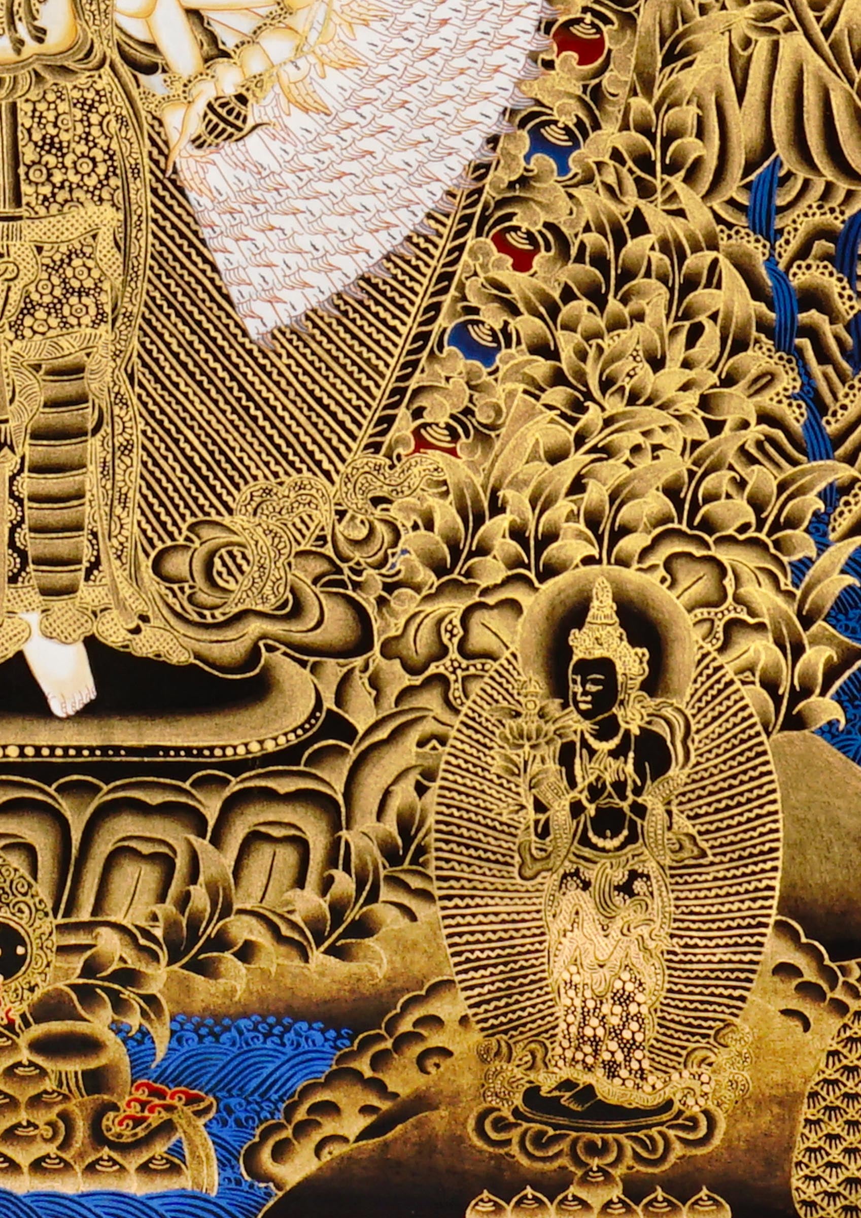 Hand-painted Thousand-Armed Avalokiteshvara thangka in gold on black background showing eleven-faced Chenrezig with multiple arms standing on lotus pedestal.