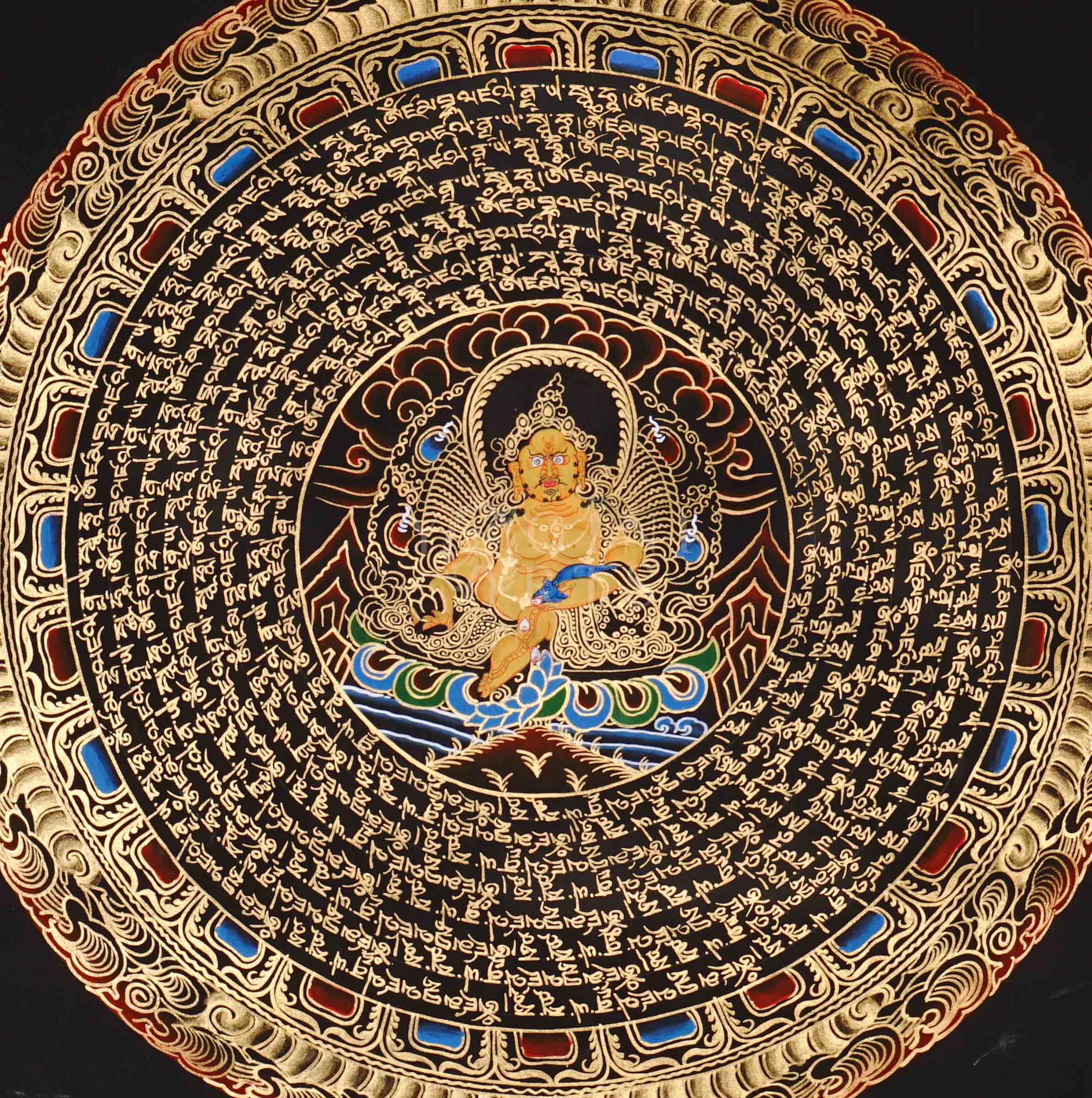 Zambhala mandala thangka featuring a central wealth deity surrounded by circular Tibetan script and intricate gold detailing on black background.