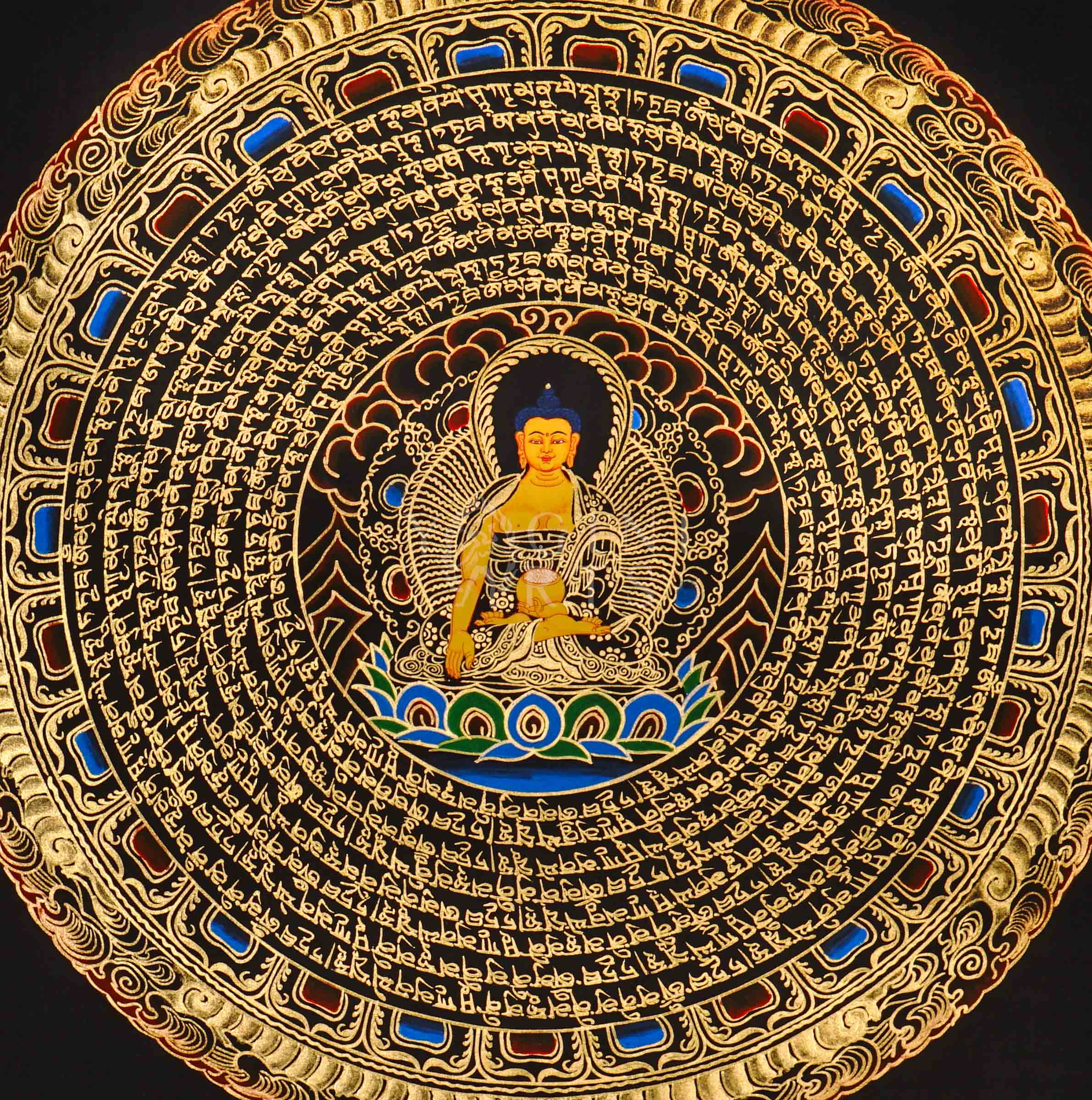 Shakyamuni Buddha mandala thangka featuring a central Buddha figure surrounded by circular Tibetan script and intricate gold detailing on a black background.