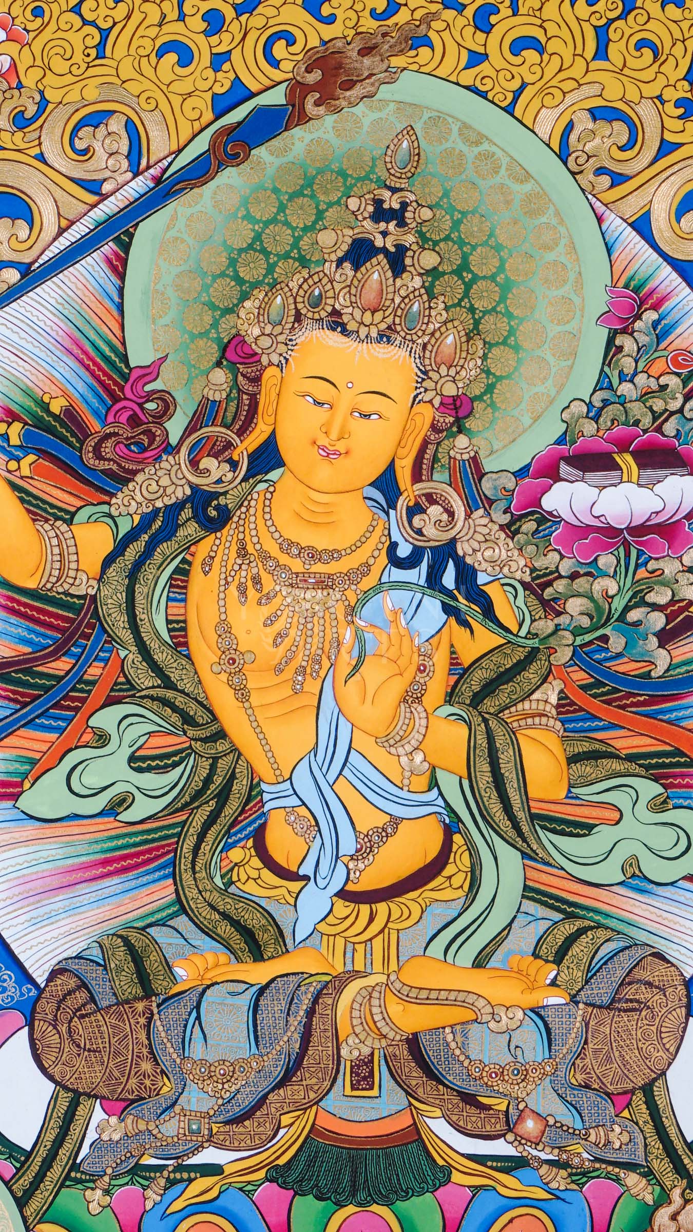 Manjushree Bodhisattva holding the flaming sword of wisdom and lotus scripture surrounded by sacred Himalayan Buddhist symbolism