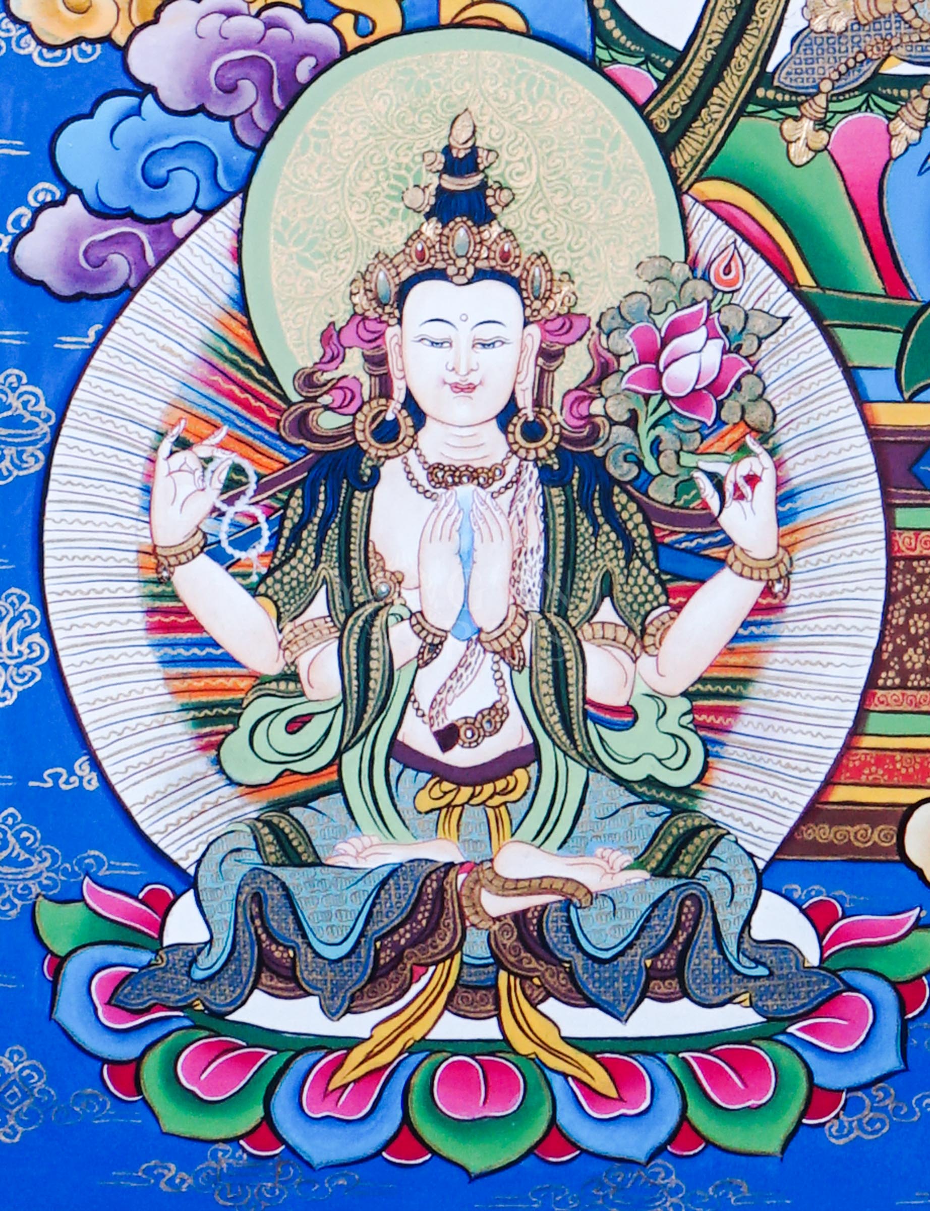 Manjushree Bodhisattva holding the flaming sword of wisdom and lotus scripture surrounded by sacred Himalayan Buddhist symbolism