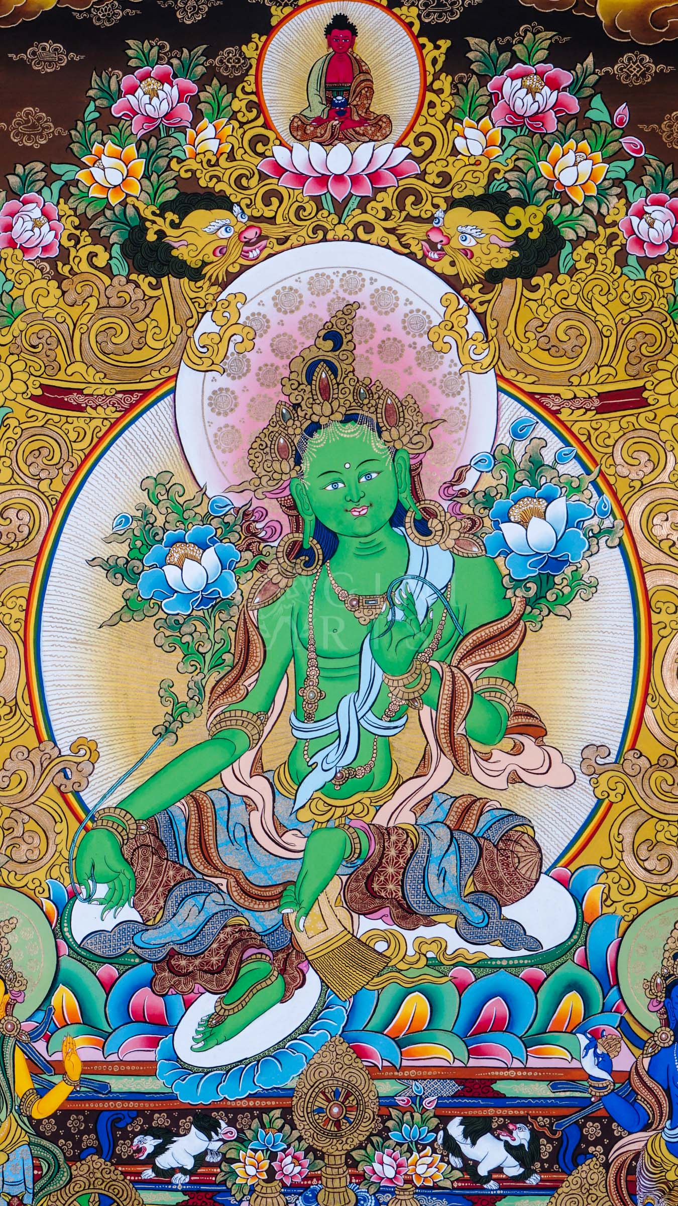 Green Tara seated on a lotus throne surrounded by floral ornamentation, sacred Buddhist symbolism, and traditional Himalayan decorative motifs.