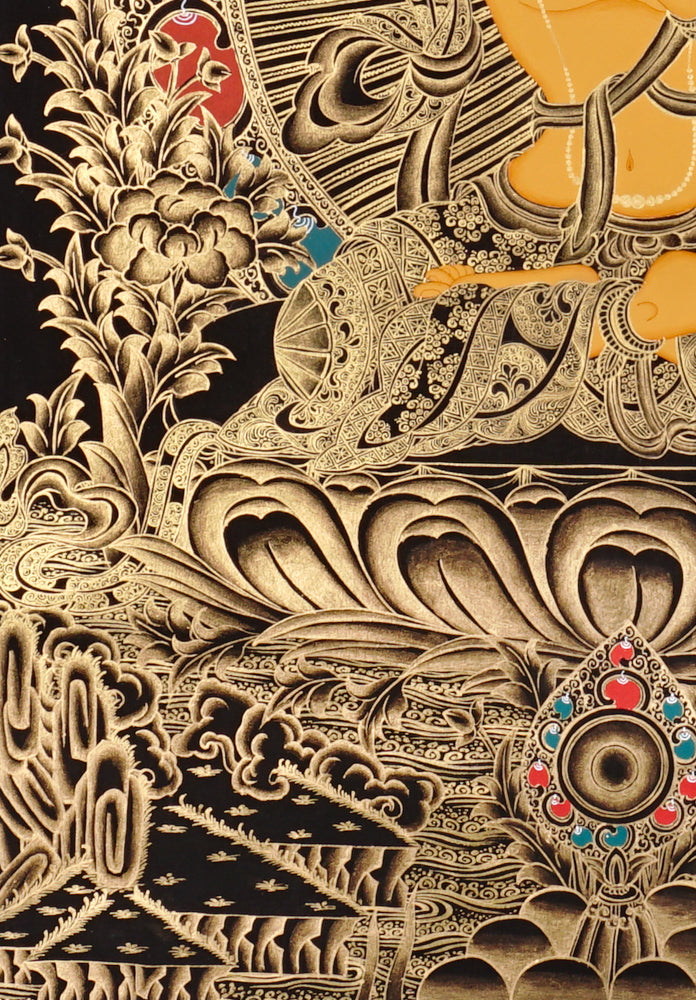 Gold-on-black Manjushri thangka holding the flaming sword of wisdom and lotus scripture.