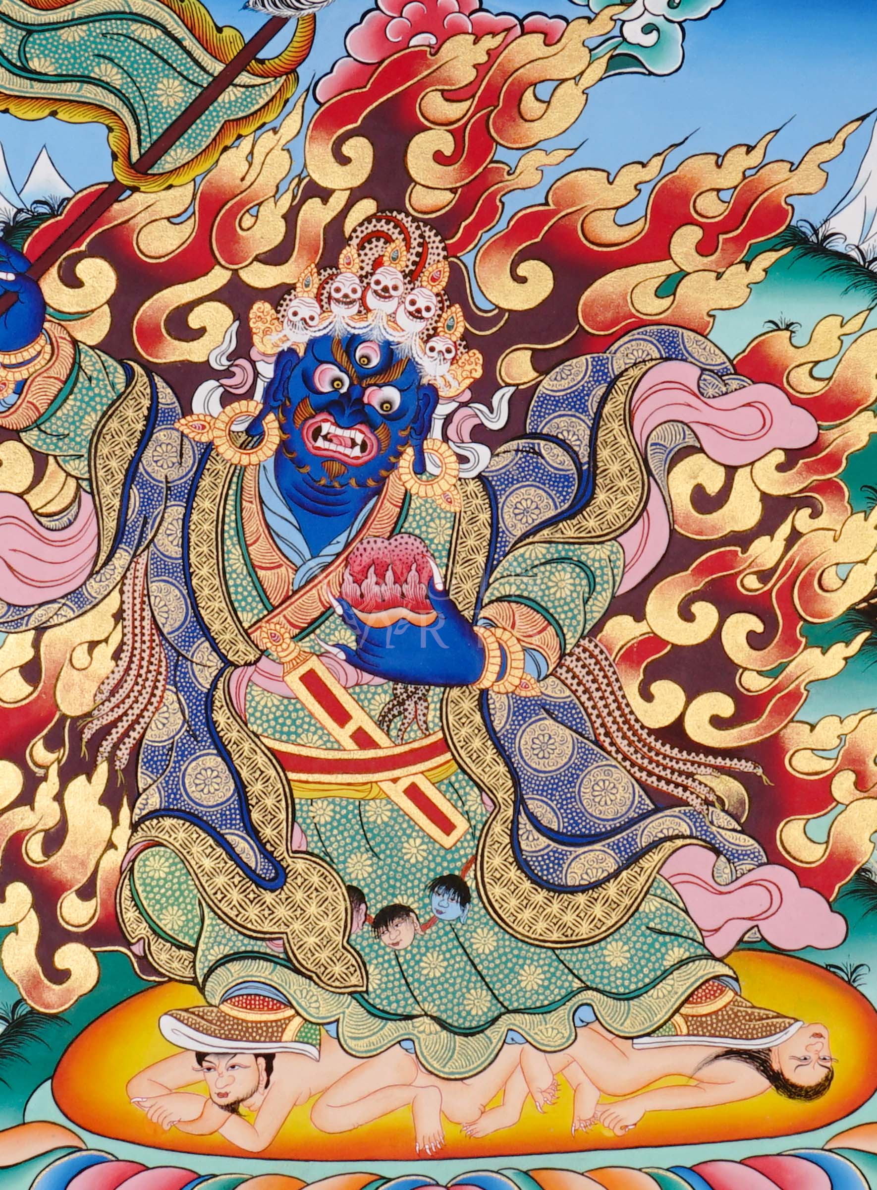 Khadga Pani thangka featuring a wrathful blue deity holding a sword, surrounded by flames and standing on subdued figures in traditional Tibetan style.