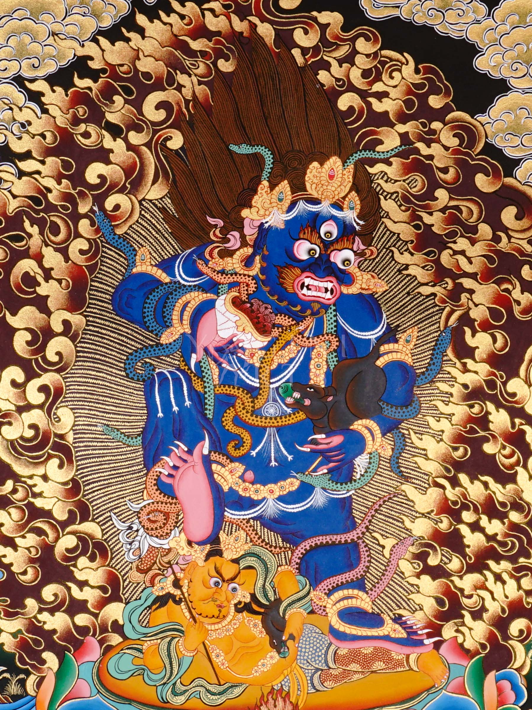 Black Dzambhala thangka showing a wrathful dark blue deity holding a mongoose, surrounded by flames and standing on subdued figures in Tibetan Buddhist style.