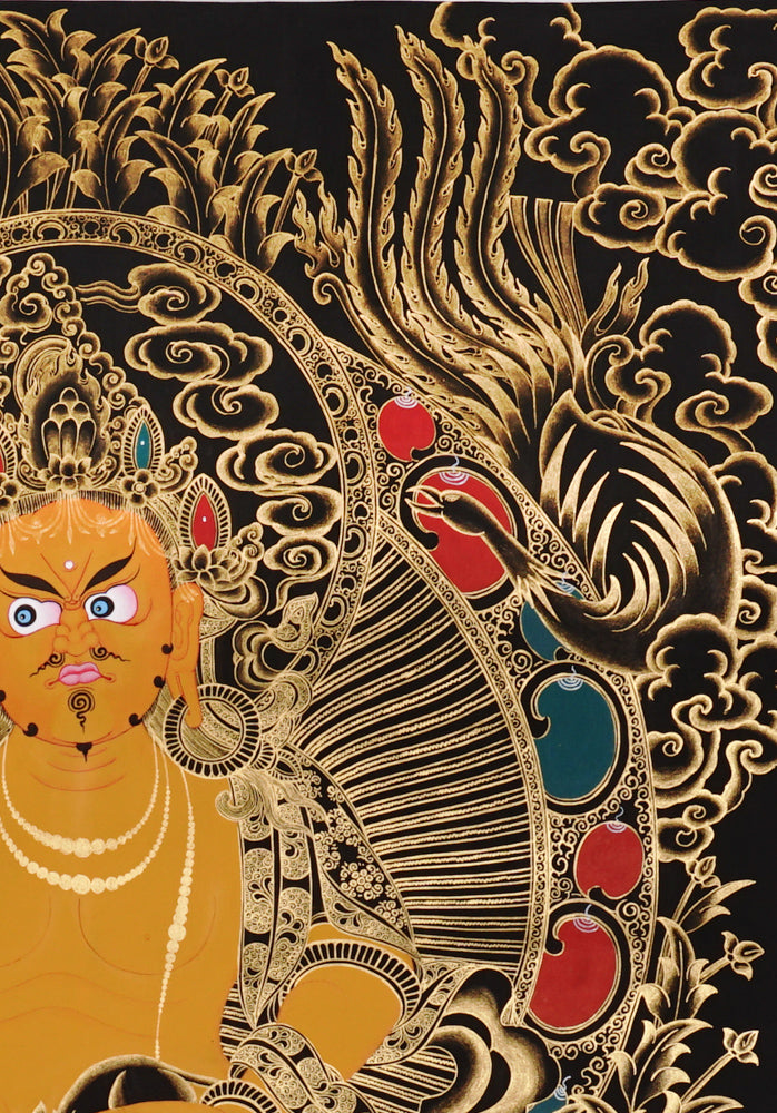 Gold-on-black Zambhala thangka depicting the Tibetan Buddhist wealth deity holding a jewel and mongoose.
