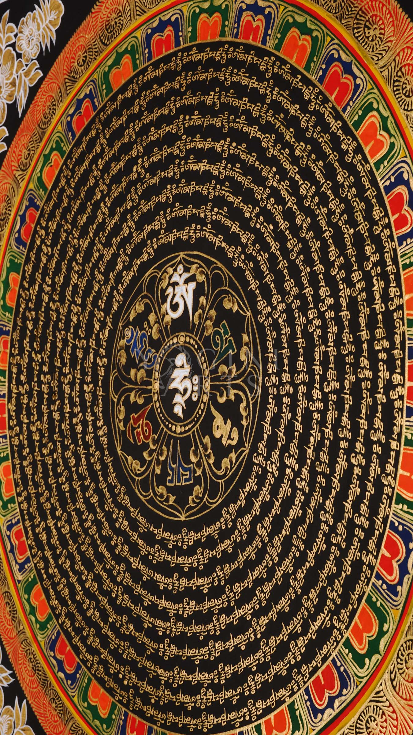 Tibetan mantra mandala thangka on black background with gold script, floral corner designs, and sacred border text.