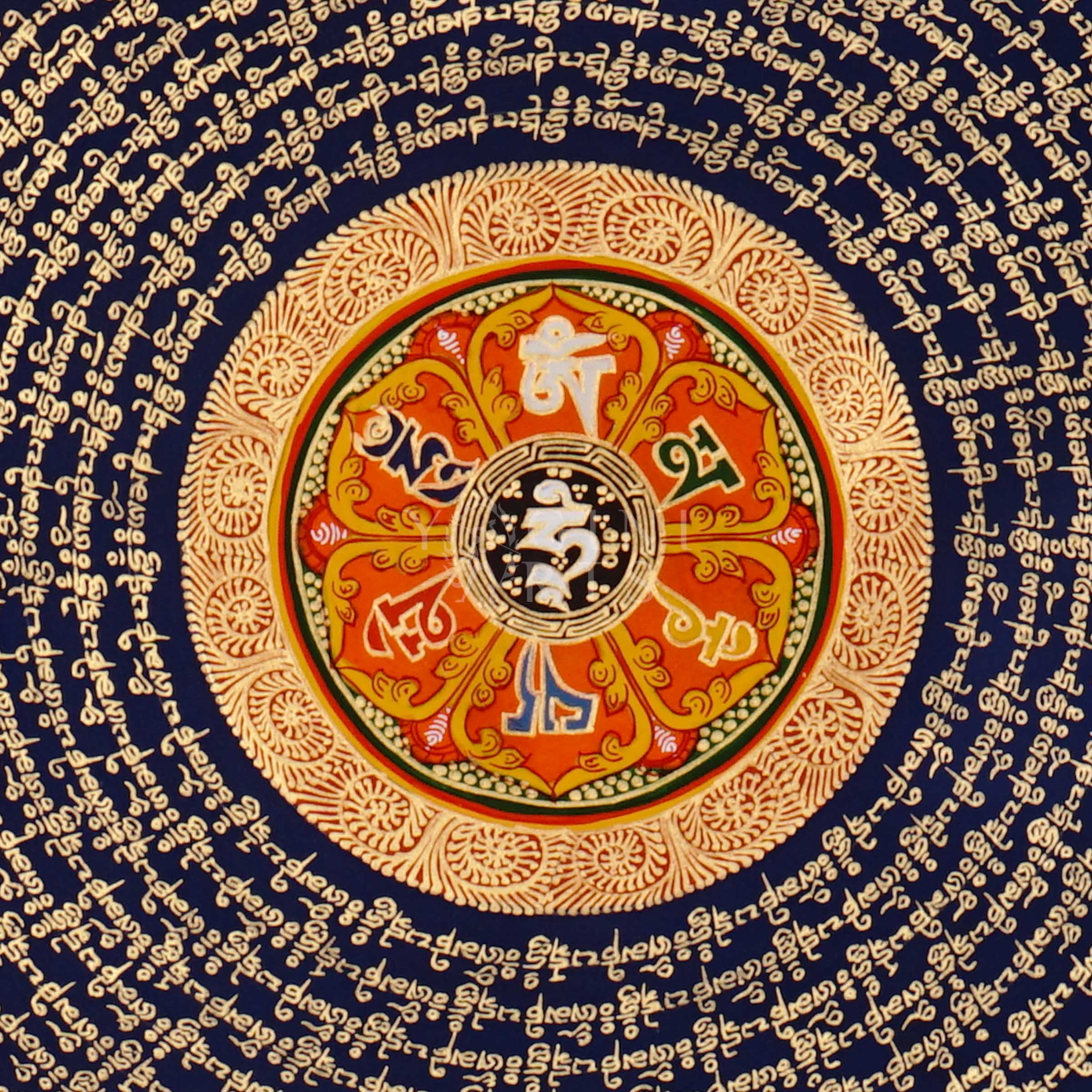 Tibetan mantra mandala thangka with blue background, gold script rings, colorful outer mantra band, and floral corner decorations.