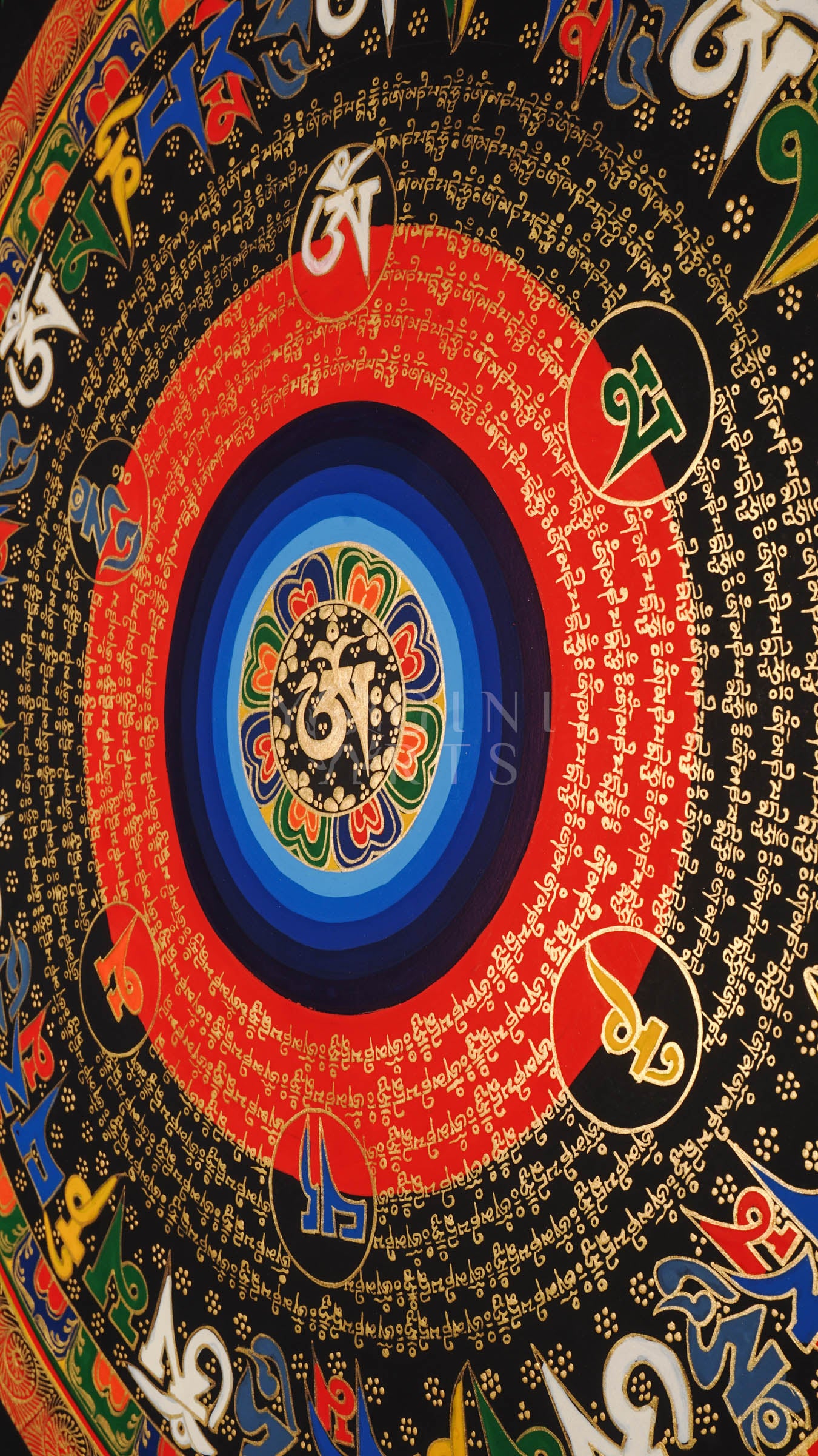 Tibetan mantra mandala thangka with black background, multicolor central rings, gold script circles, and floral corner designs.