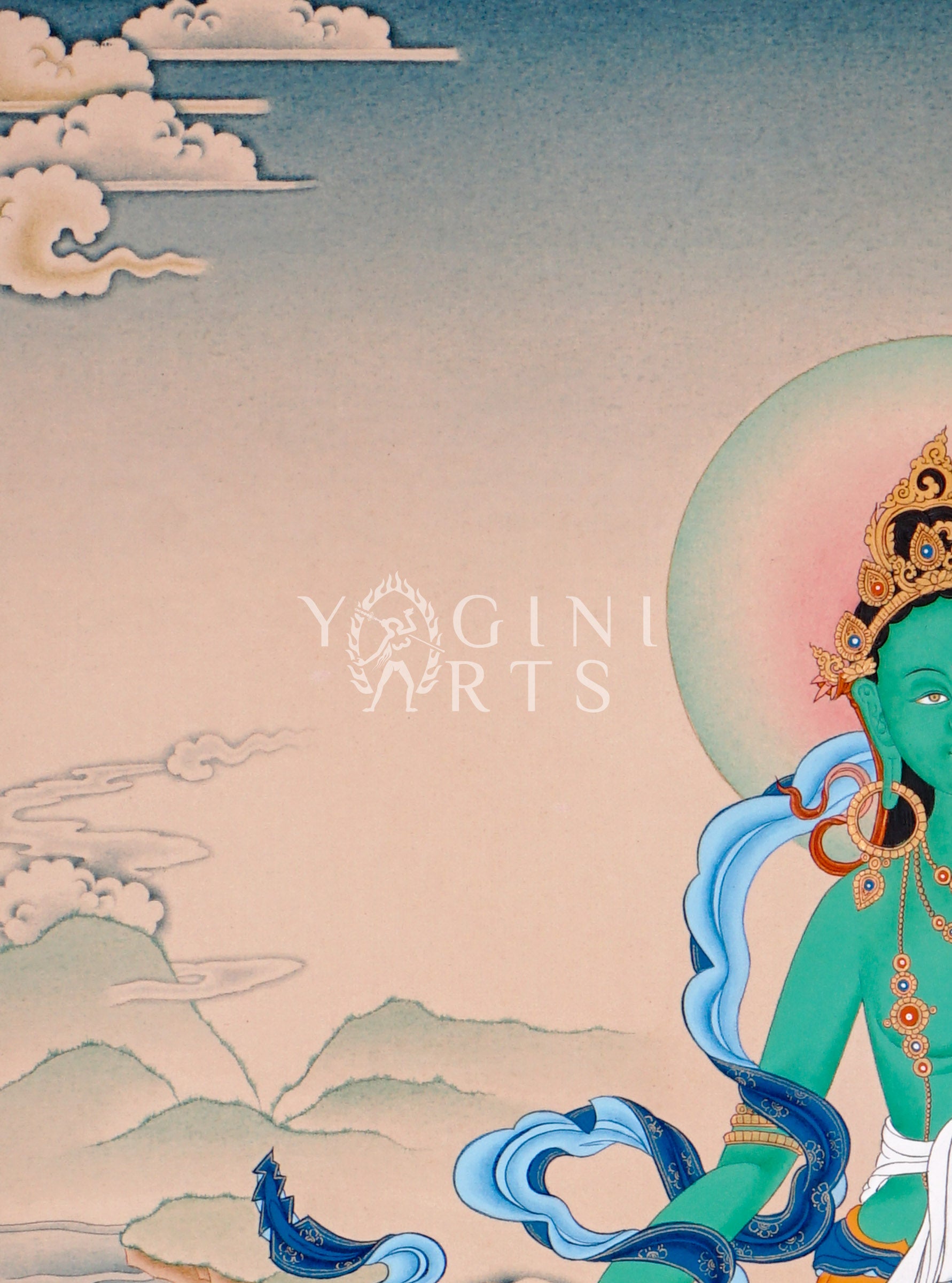 Hand-painted Green Tara thangka featuring the Tibetan Buddhist goddess seated on a lotus throne holding a blue lotus flower in a peaceful Himalayan landscape