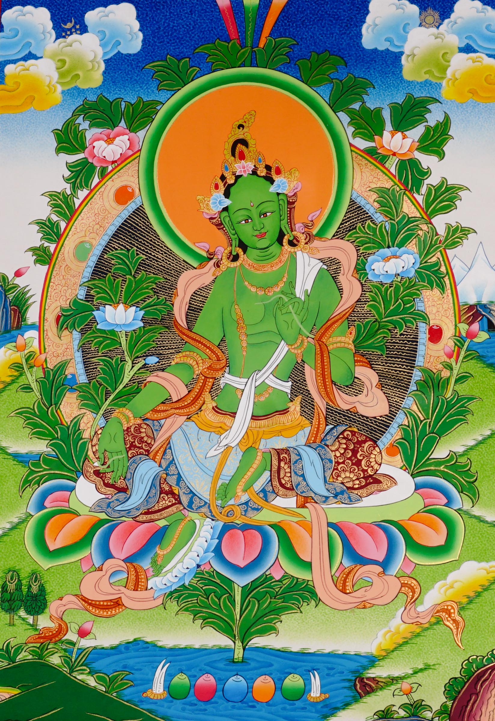 Green Tara thangka featuring the Tibetan Buddhist goddess seated on a lotus throne surrounded by flowers and sacred Himalayan landscape