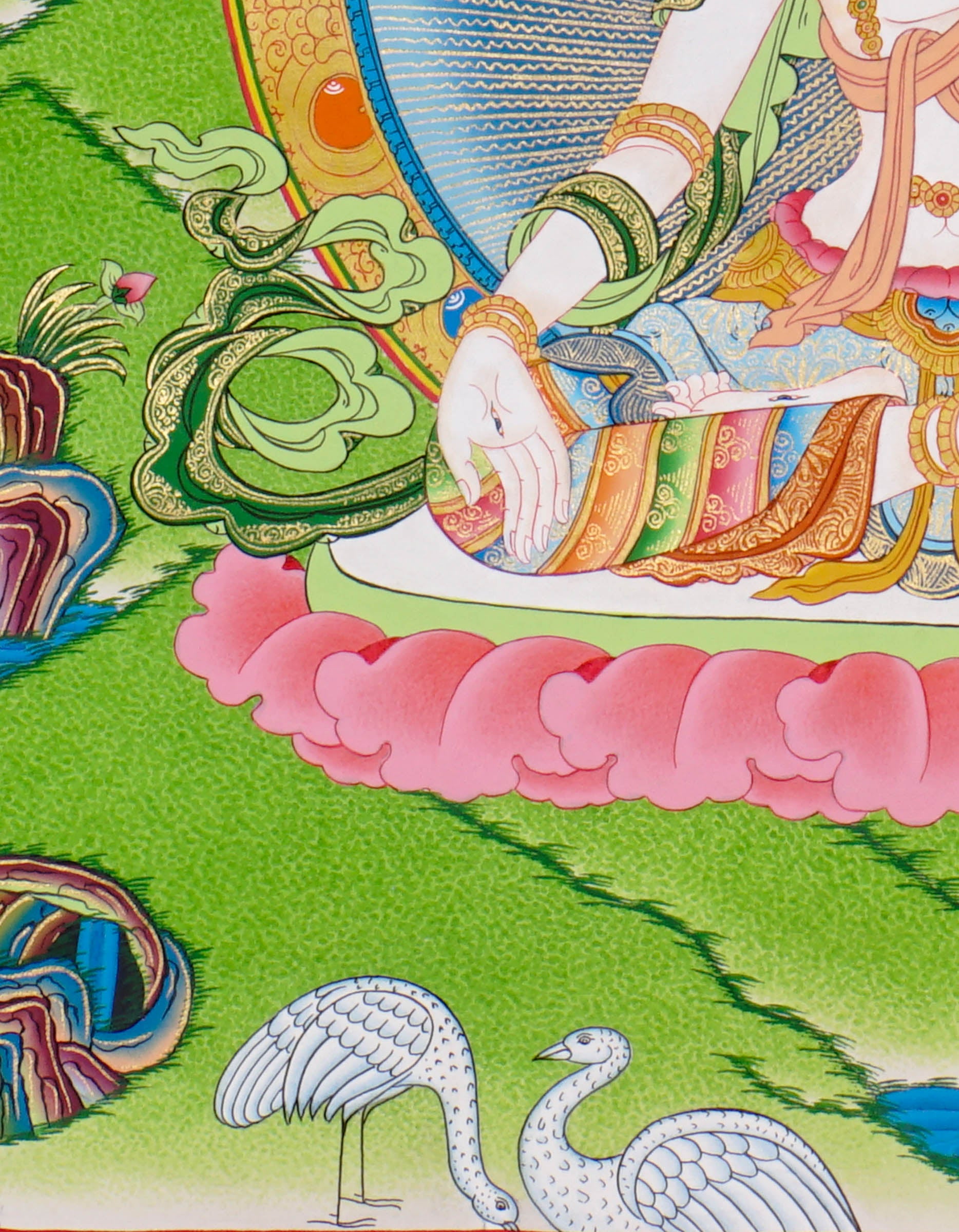 Hand-painted White Tara thangka featuring the Tibetan Buddhist goddess seated on a lotus throne surrounded by flowers, rivers, and peaceful Himalayan landscape