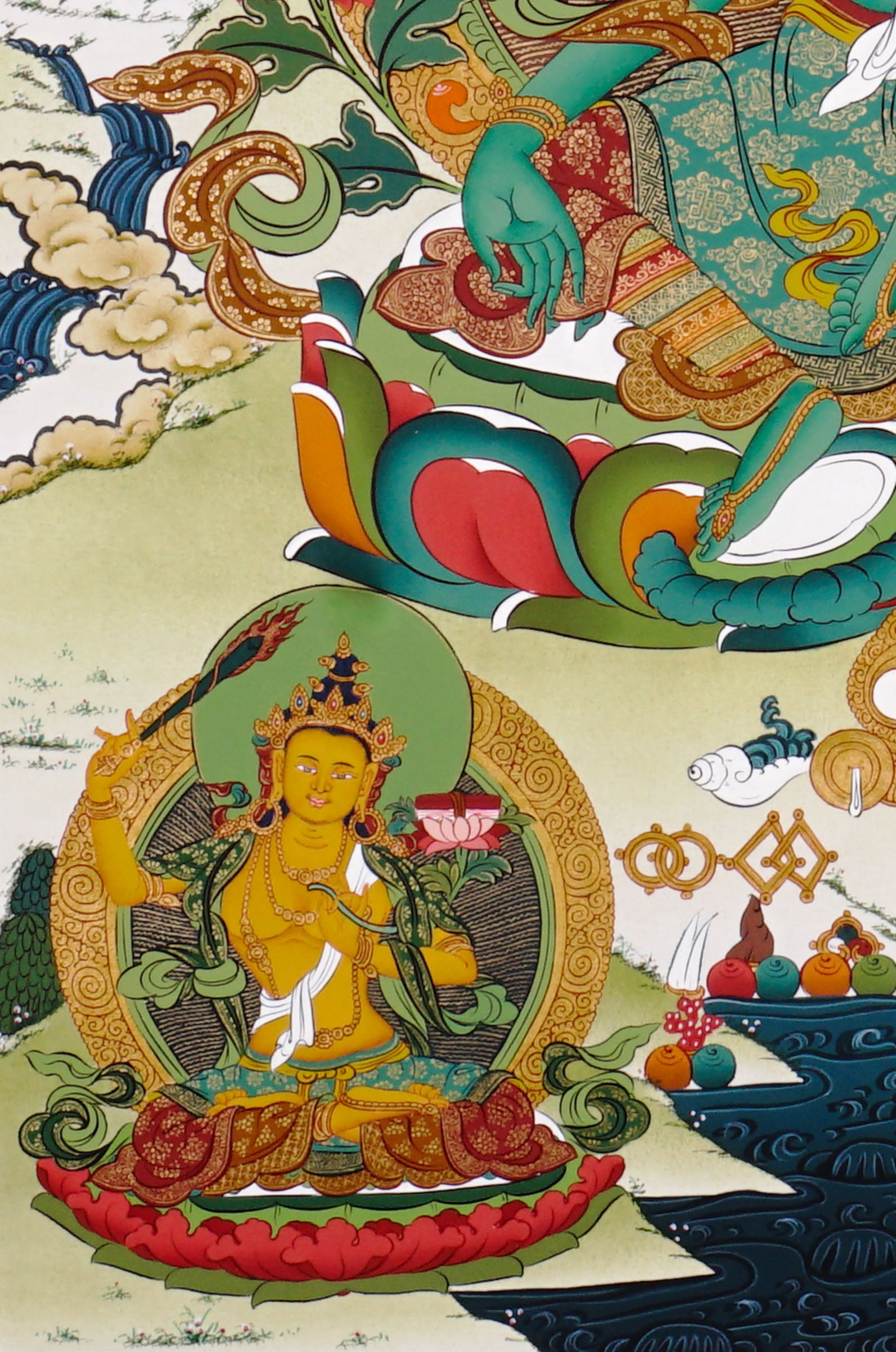 Hand-painted Tibetan Green Tara thangka featuring the Buddhist goddess seated on a lotus throne surrounded by sacred deities and floral Himalayan scenery