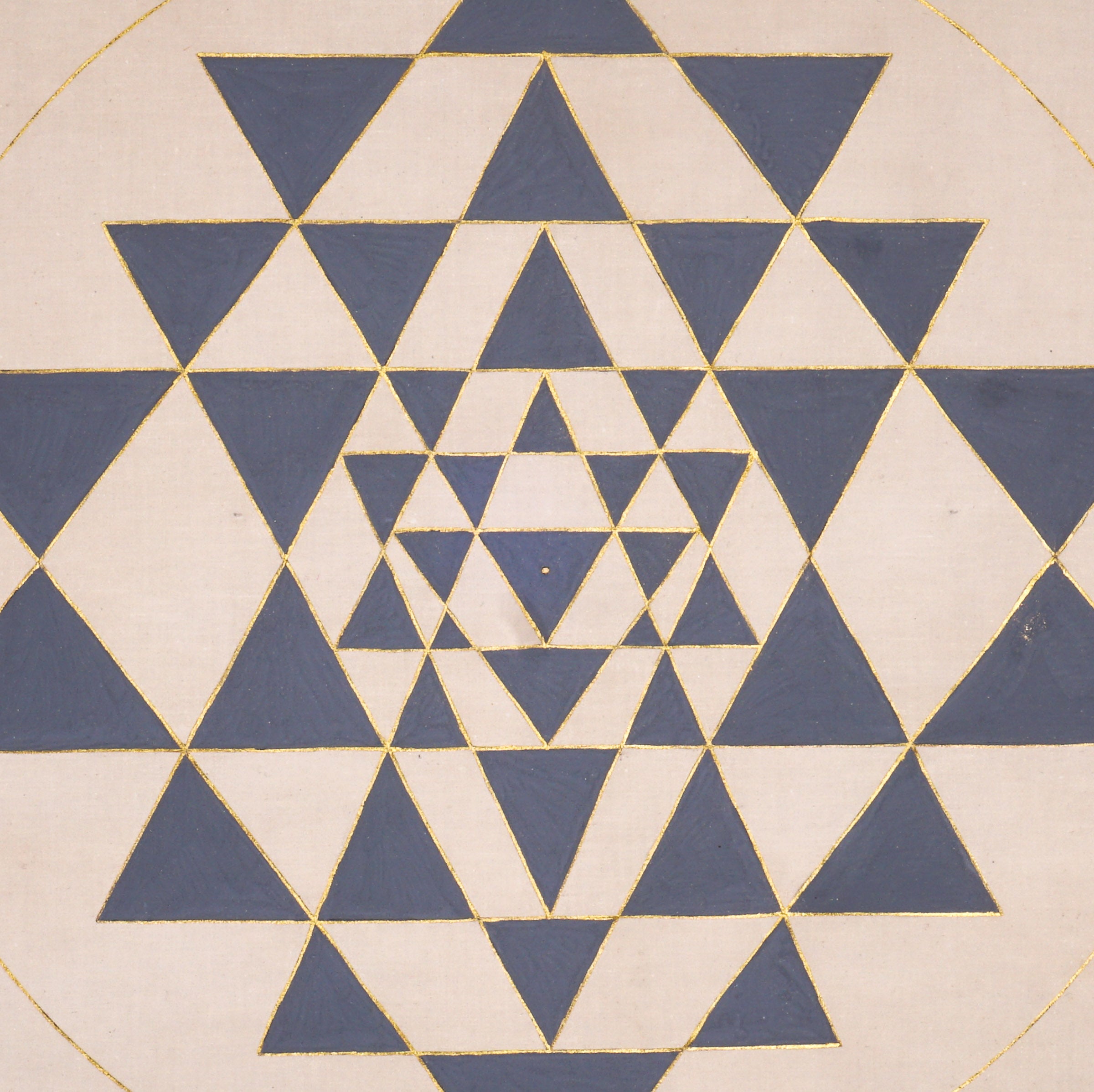 Shree Yantra sacred geometry artwork featuring interlocking blue triangles and gold outlines within a circular mandala