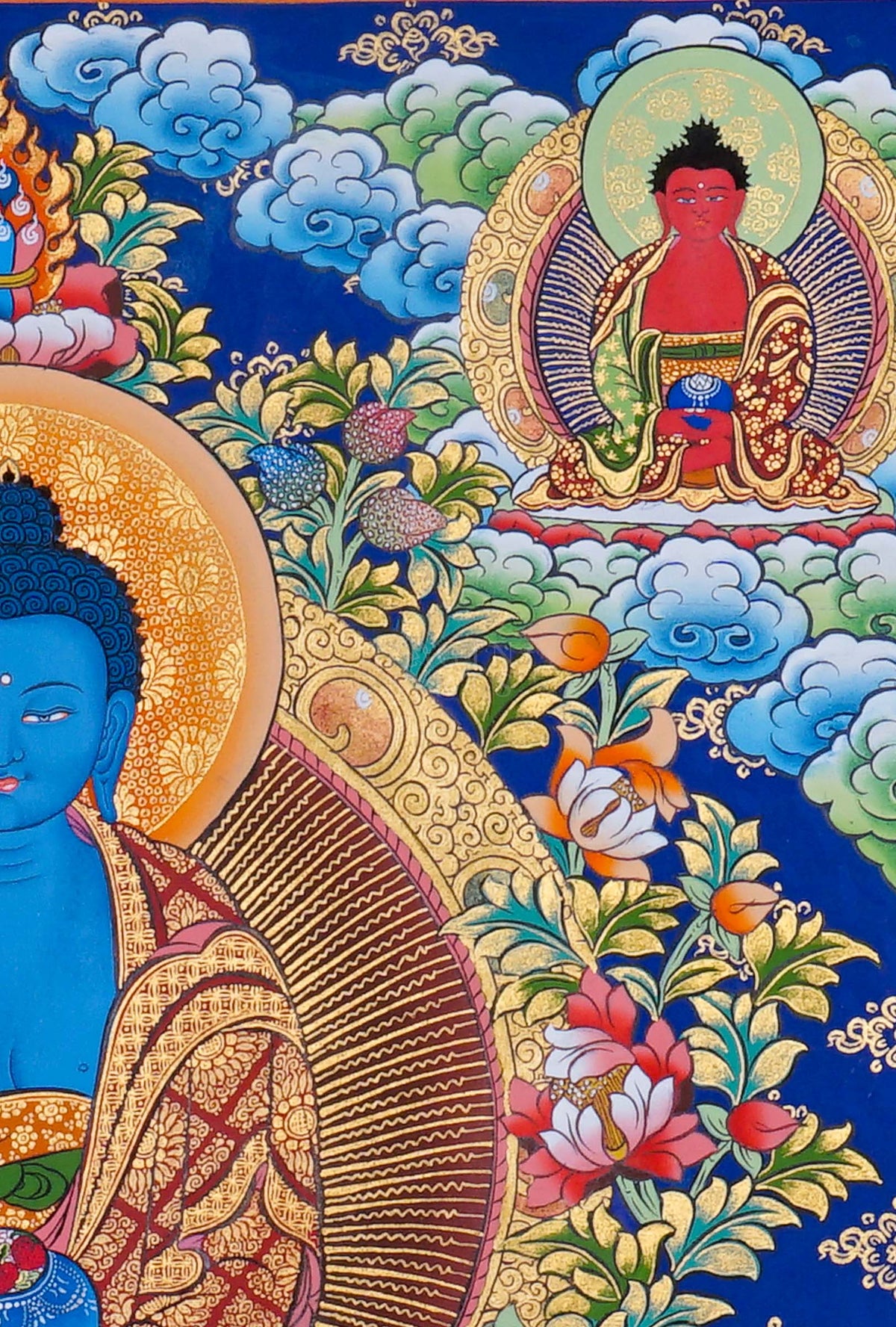 Medicine Buddha Thangka painting featuring blue Bhaisajyaguru with Buddhist figures, lotus flowers and traditional Himalayan Buddhist artwork from Nepal