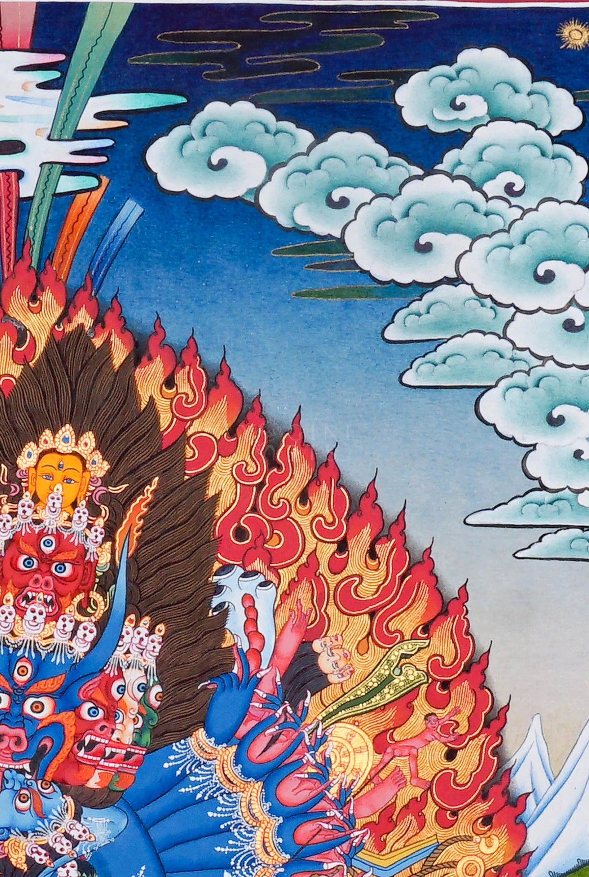 Yamantaka Thangka painting depicting the wrathful Buddhist deity surrounded by flames, symbolic figures, lotus petals and Himalayan landscape in traditional Tibetan Buddhist art from Nepal