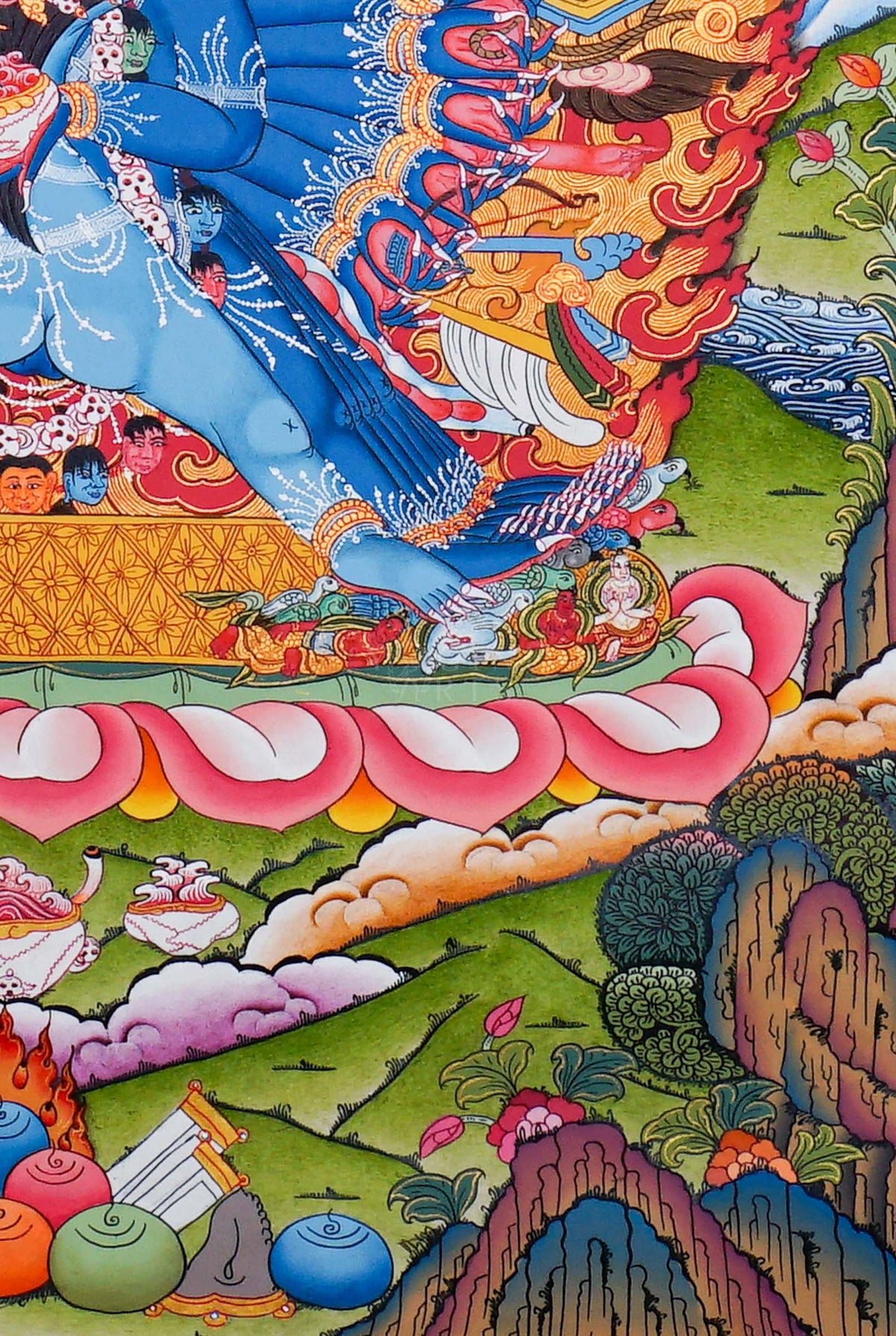 Yamantaka Thangka painting depicting the wrathful Buddhist deity surrounded by flames, symbolic figures, lotus petals and Himalayan landscape in traditional Tibetan Buddhist art from Nepal